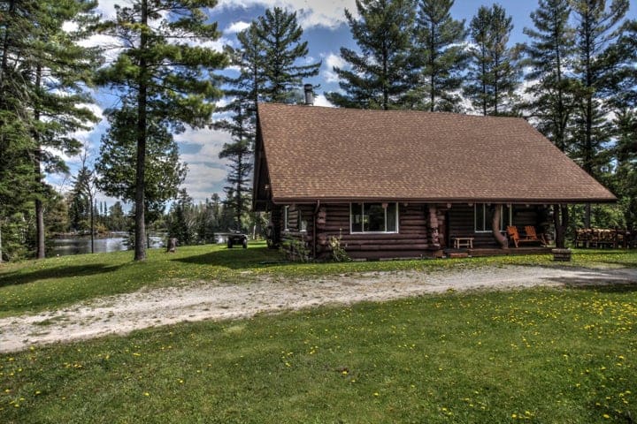 Log Home on Thunder Bay River W/ 22 Acres for Sale Hillman MI
