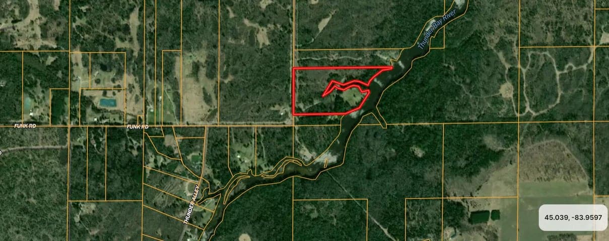 Log Home on Thunder Bay River W/ 22 Acres for Sale Hillman MI