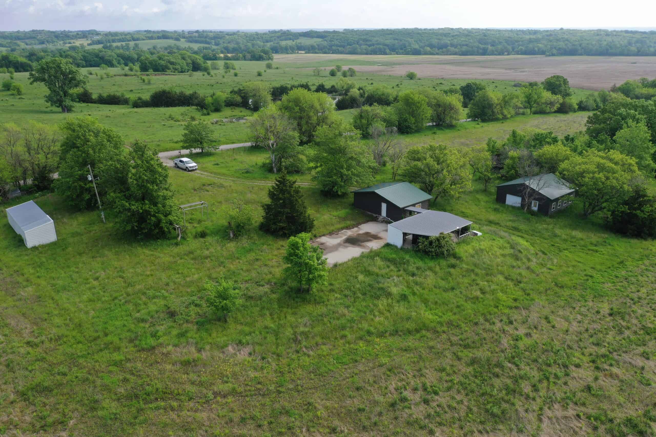 75 Acres m/l with Buildings/ Lake/ Income