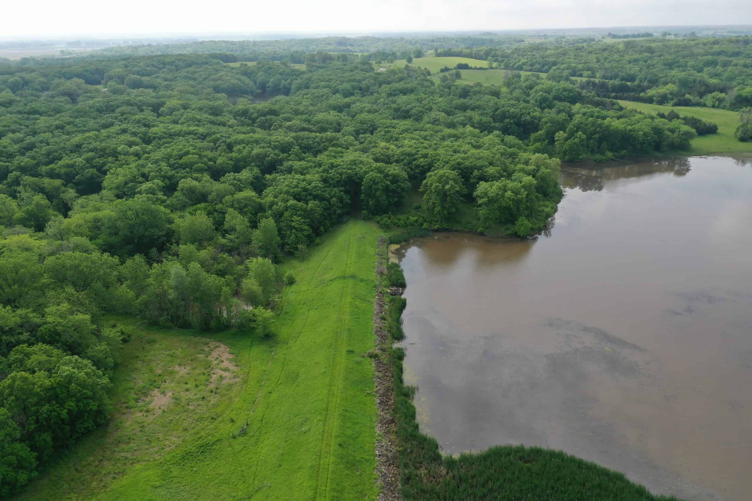 75 Acres m/l with Buildings/ Lake/ Income