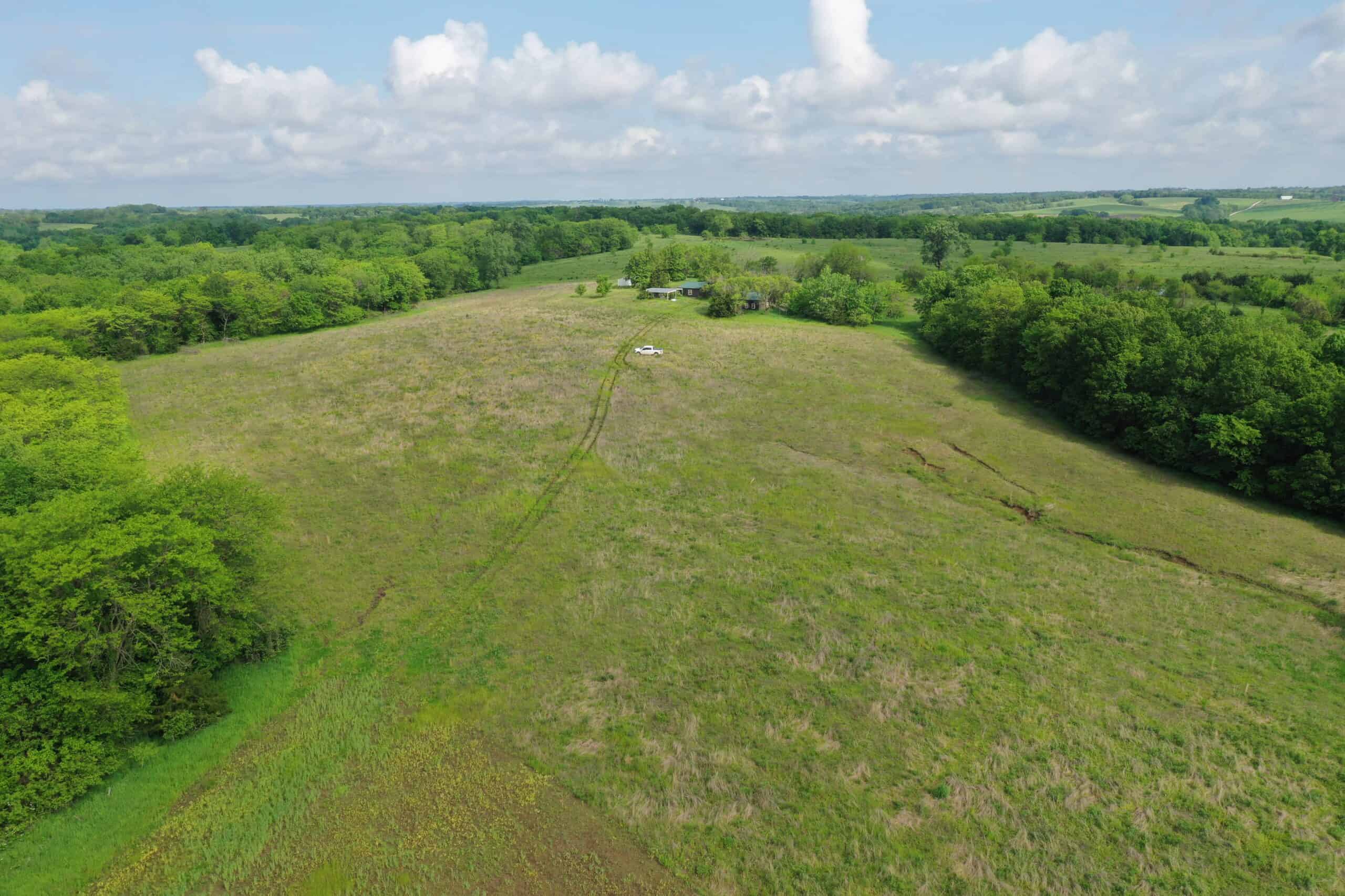 75 Acres m/l with Buildings/ Lake/ Income