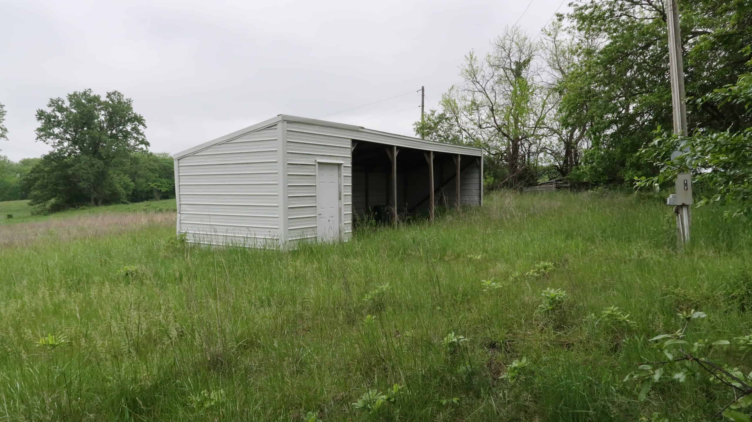 75 Acres m/l with Buildings/ Lake/ Income