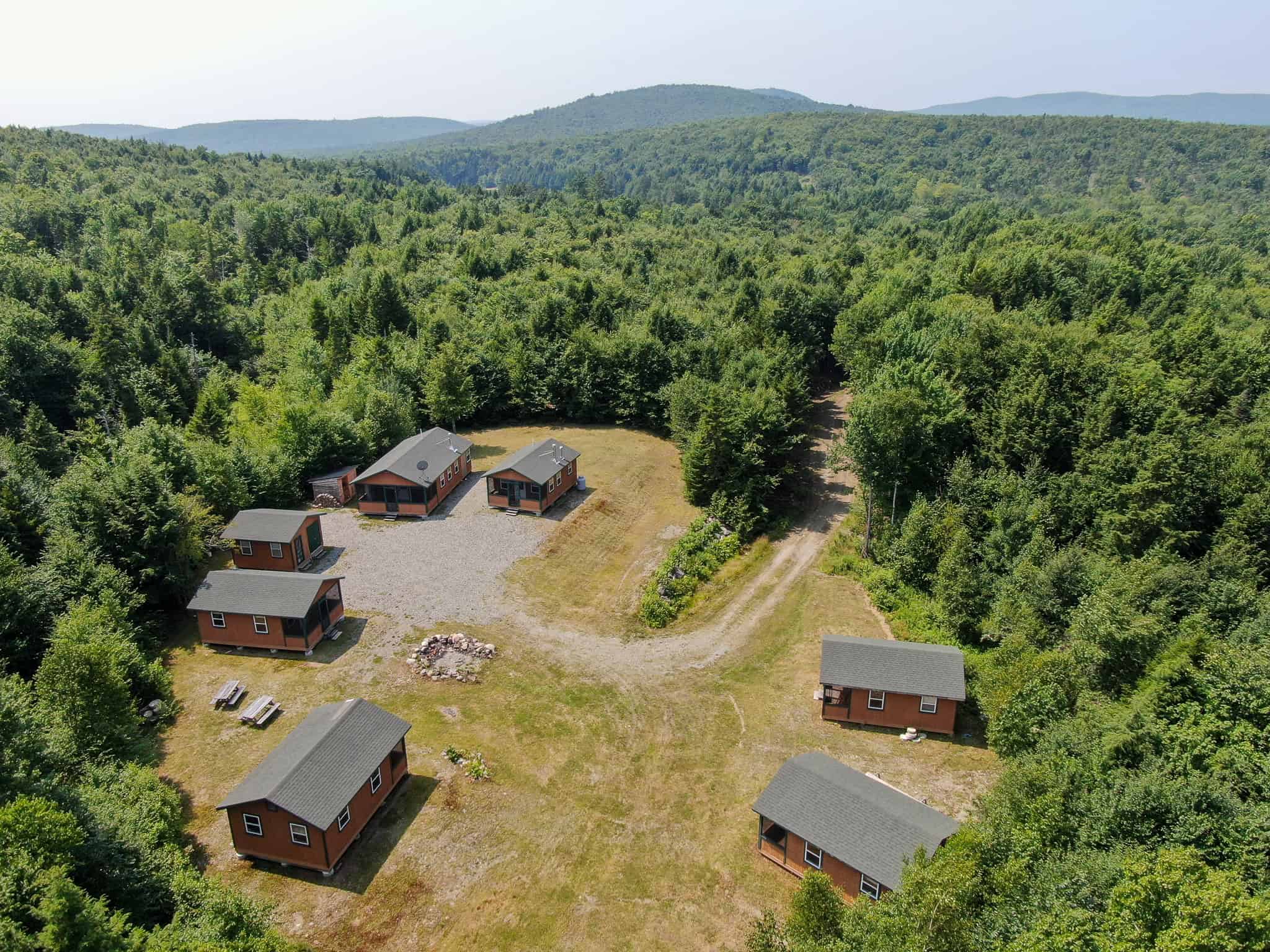 645 Acres, 6 Cabins, Pond, Brooks, and Outdoor Adventures