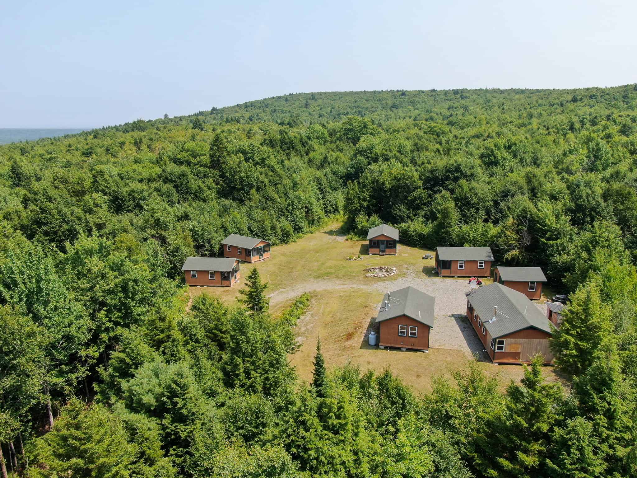 645 Acres, 6 Cabins, Pond, Brooks, and Outdoor Adventures