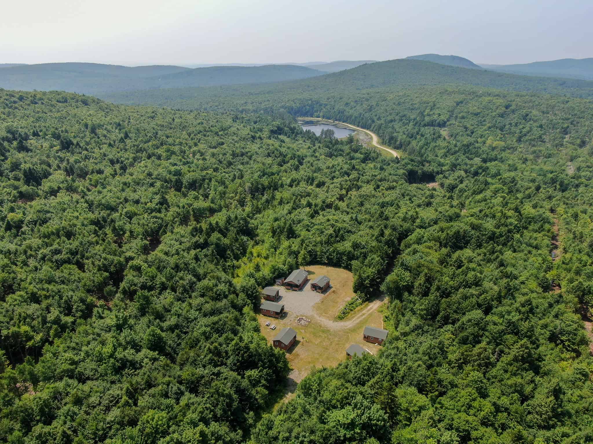 645 Acres, 6 Cabins, Pond, Brooks, and Outdoor Adventures