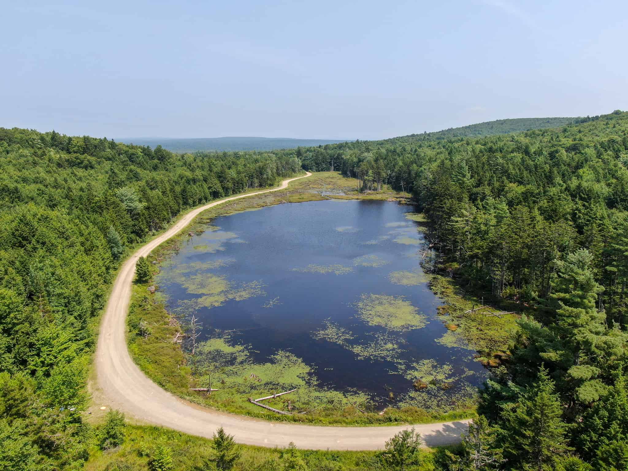 645 Acres, 6 Cabins, Pond, Brooks, and Outdoor Adventures