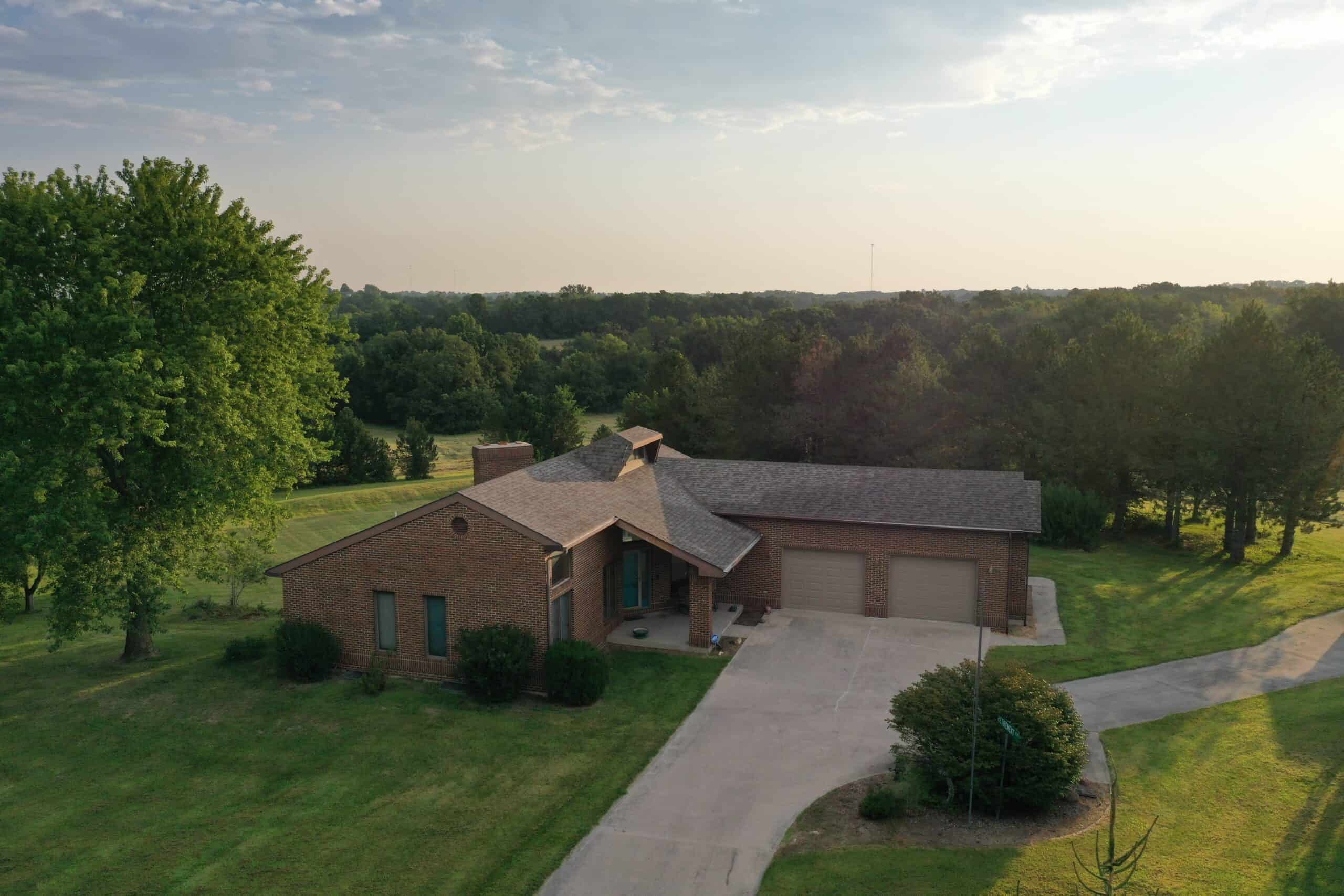 Home & Outbuildings on Acreage in Gentry County