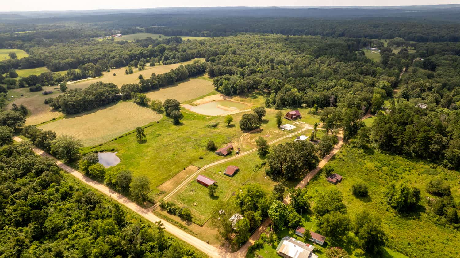 Log Cabin with Outbuildings and Acreage in Ripley County, Missouri