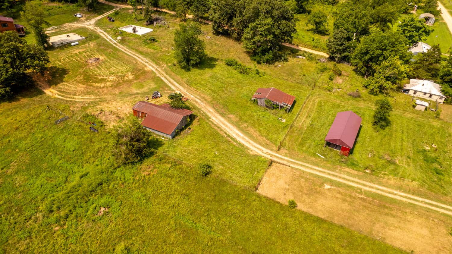 Log Cabin with Outbuildings and Acreage in Ripley County, Missouri