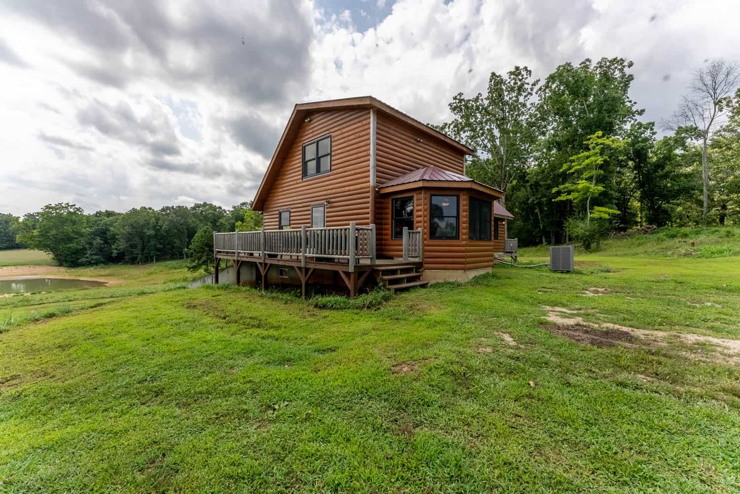 Log Cabin with Outbuildings and Acreage in Ripley County, Missouri