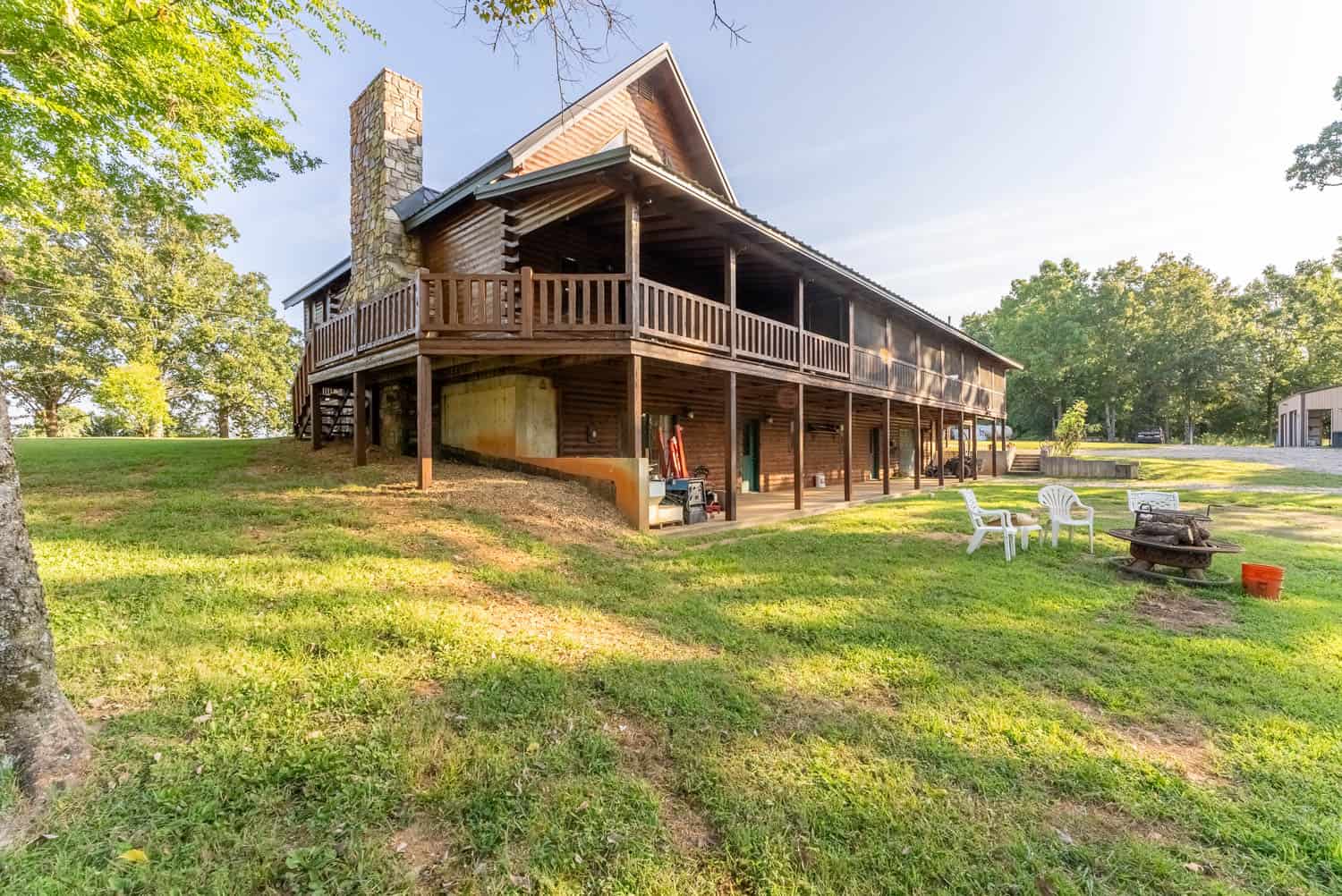 Custom Built Log Cabin and 57 Wooded Acres in Thayer MO