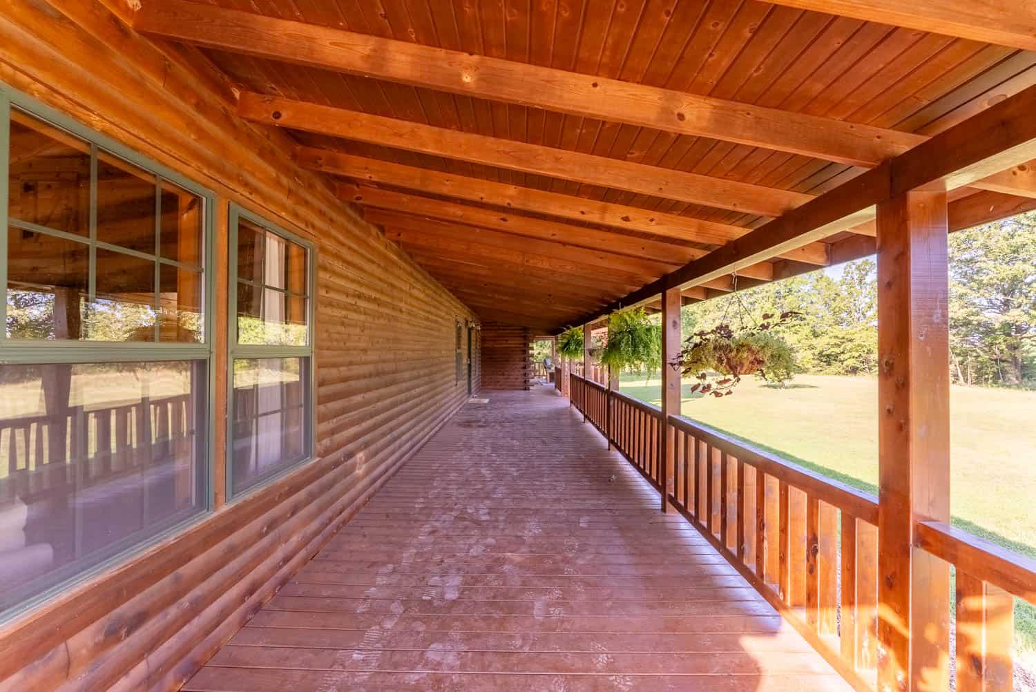 Custom Built Log Cabin and 57 Wooded Acres in Thayer MO