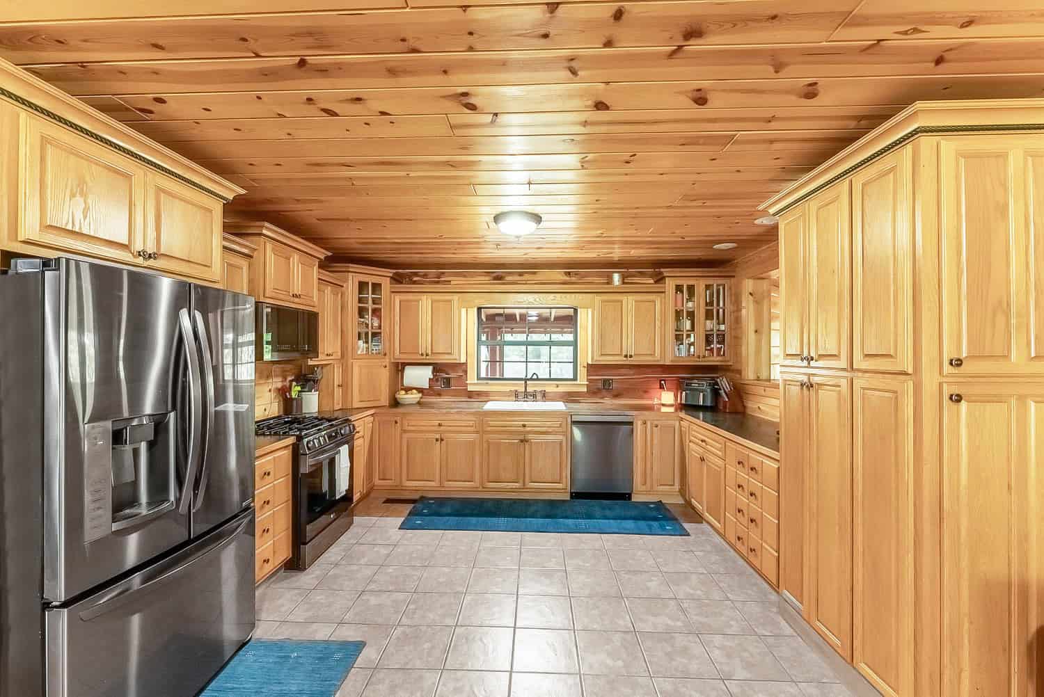 Custom Built Log Cabin and 57 Wooded Acres in Thayer MO