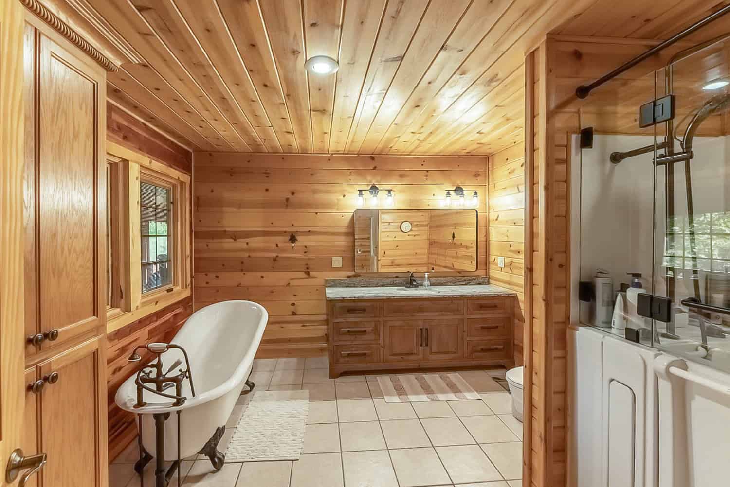 Custom Built Log Cabin and 57 Wooded Acres in Thayer MO