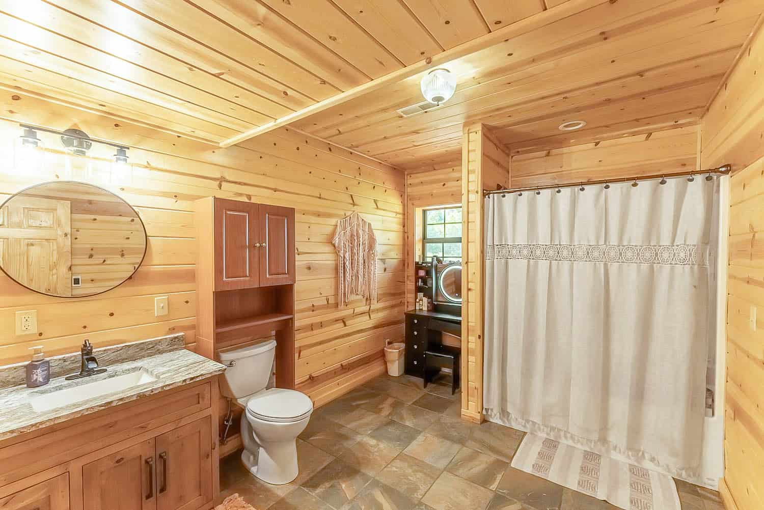 Custom Built Log Cabin and 57 Wooded Acres in Thayer MO