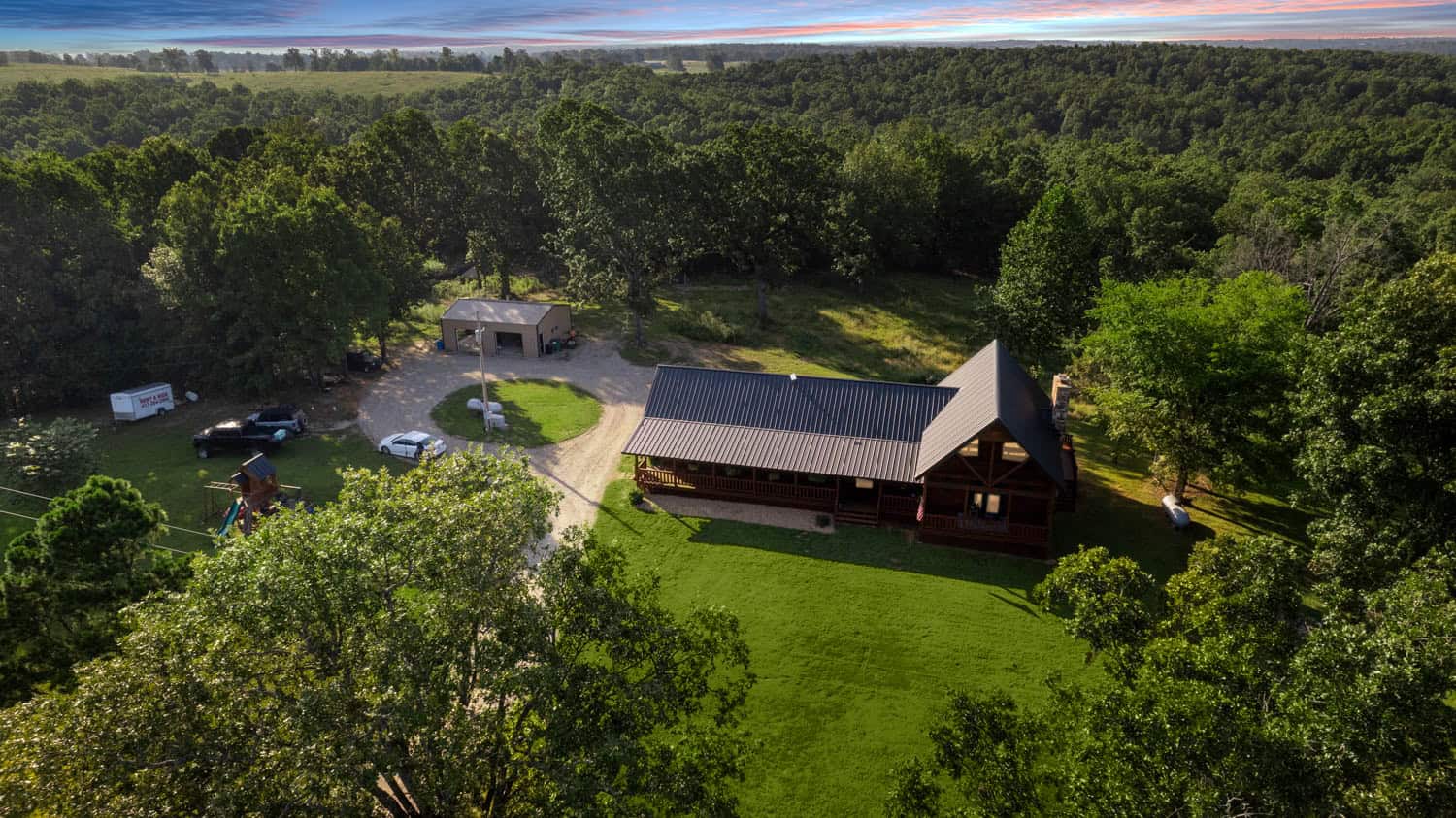Custom Built Log Cabin and 57 Wooded Acres in Thayer MO