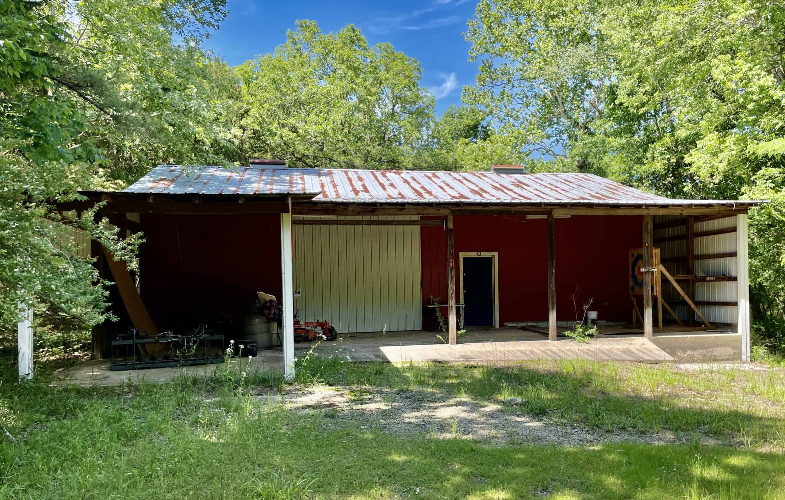 95 Acres of Hunting Land with Log Home For Sale in Arkansas