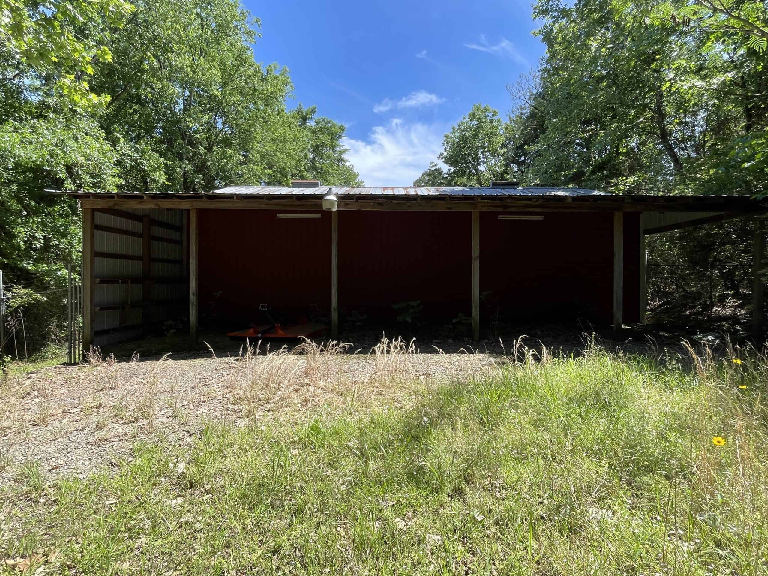 95 Acres of Hunting Land with Log Home For Sale in Arkansas