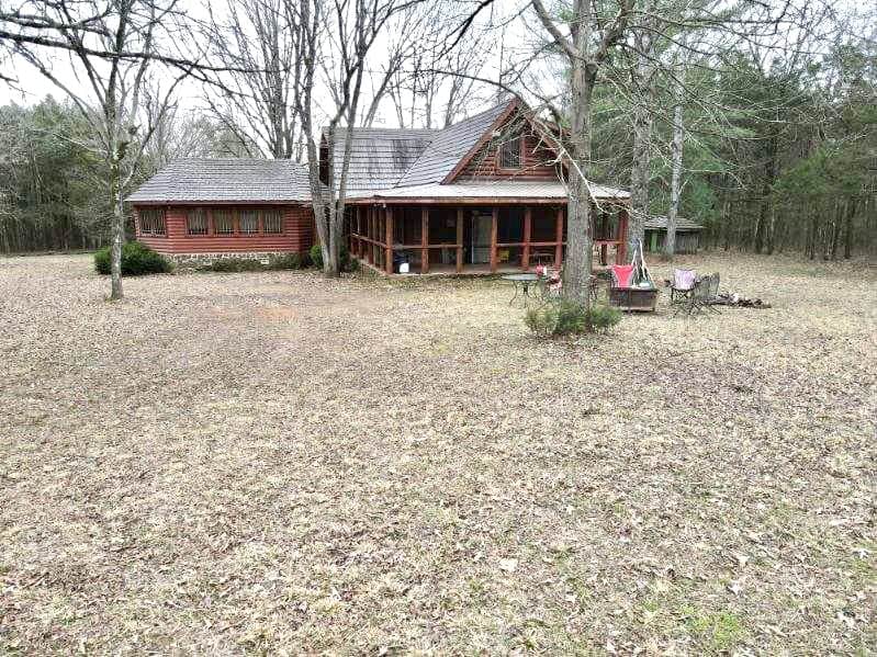 95 Acres of Hunting Land with Log Home For Sale in Arkansas