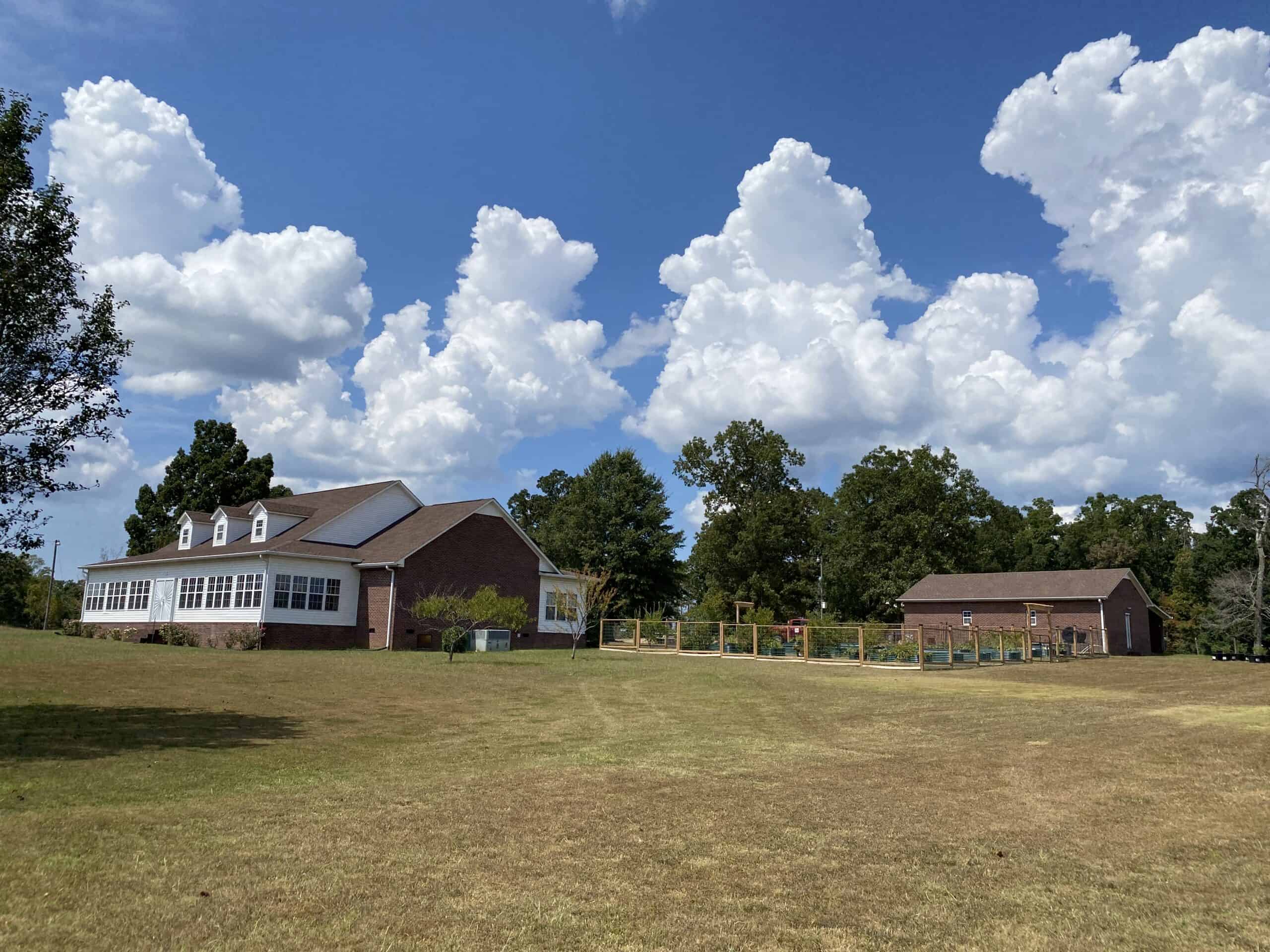 PRIVATE FARM FOR SALE IN TN NEAR TENNESSEE RIVER WITH POND, CREEK, FENCING, PASTURES, AND SHOP. GREAT DEER HUNTING.