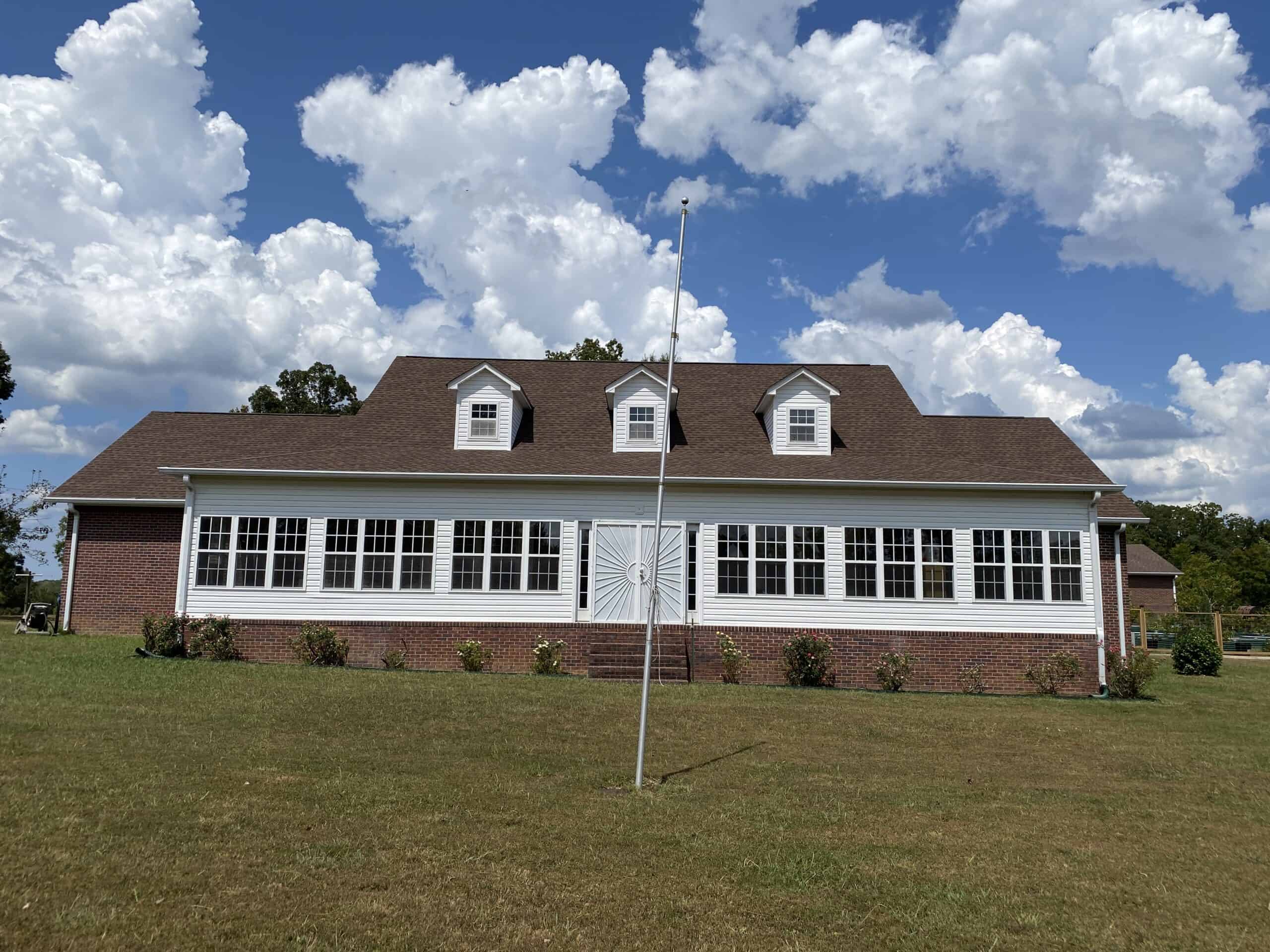 PRIVATE FARM FOR SALE IN TN NEAR TENNESSEE RIVER WITH POND, CREEK, FENCING, PASTURES, AND SHOP. GREAT DEER HUNTING.