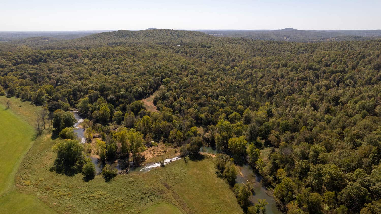 SOUTHFORK RIVER FRONTAGE PROPERTY WITH DEVELOPMENT POTENTIAL