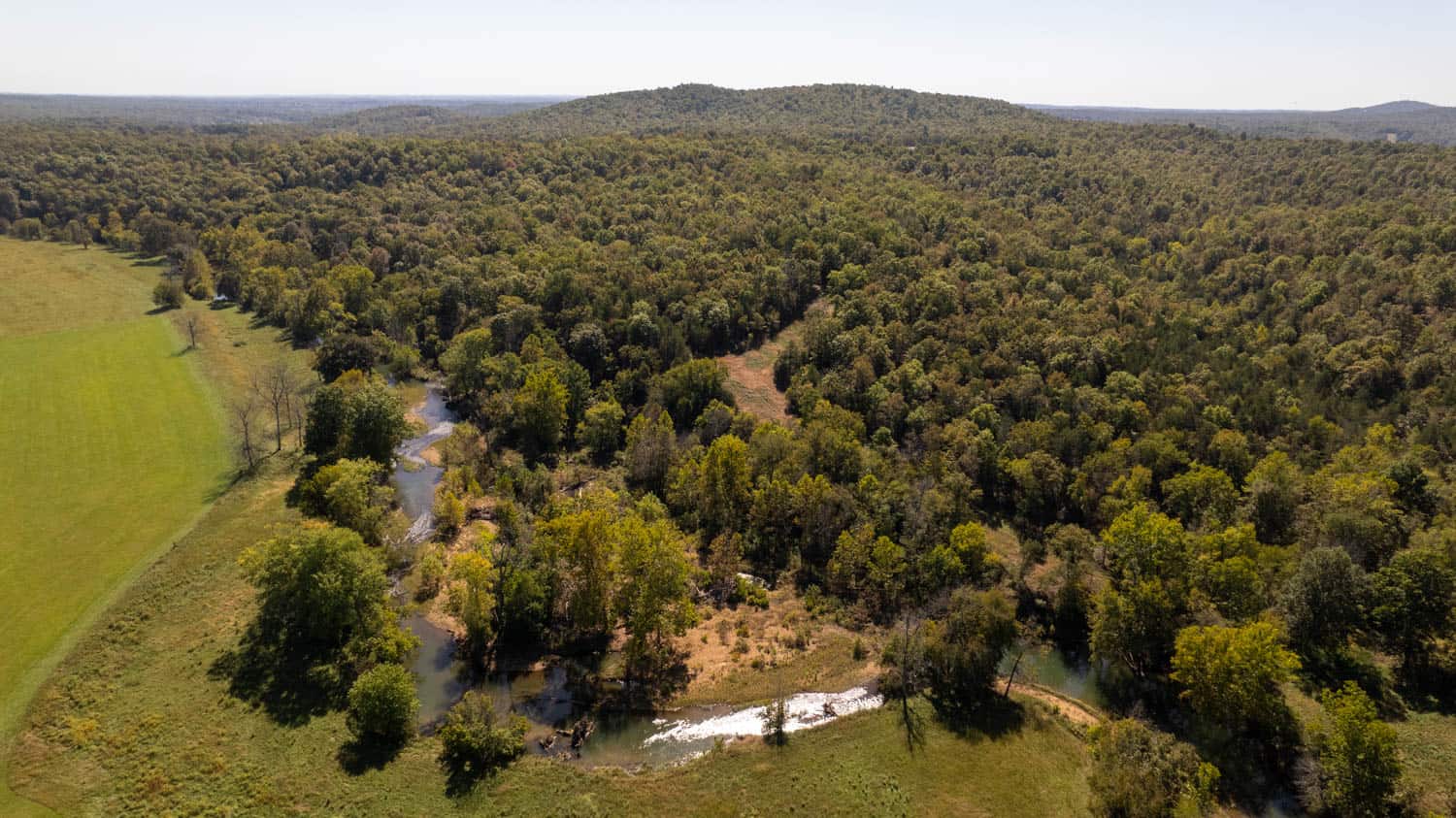 SOUTHFORK RIVER FRONTAGE PROPERTY WITH DEVELOPMENT POTENTIAL