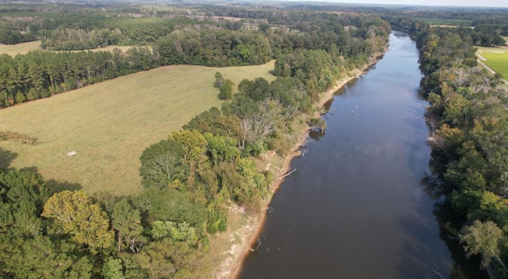 Riverfront Property For Sale with Open Pasture Fishing & Hunting