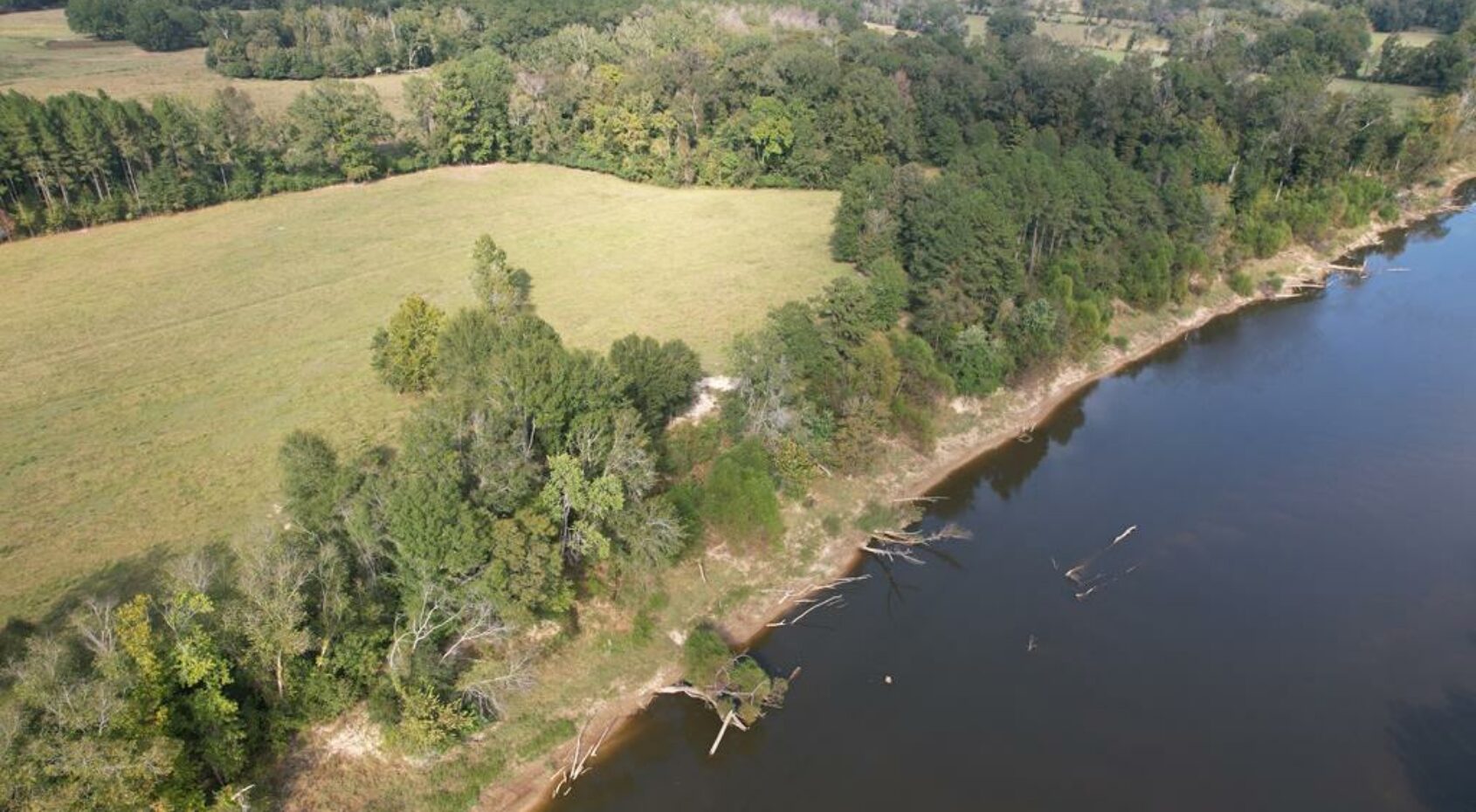 Riverfront Property For Sale with Open Pasture Fishing & Hunting