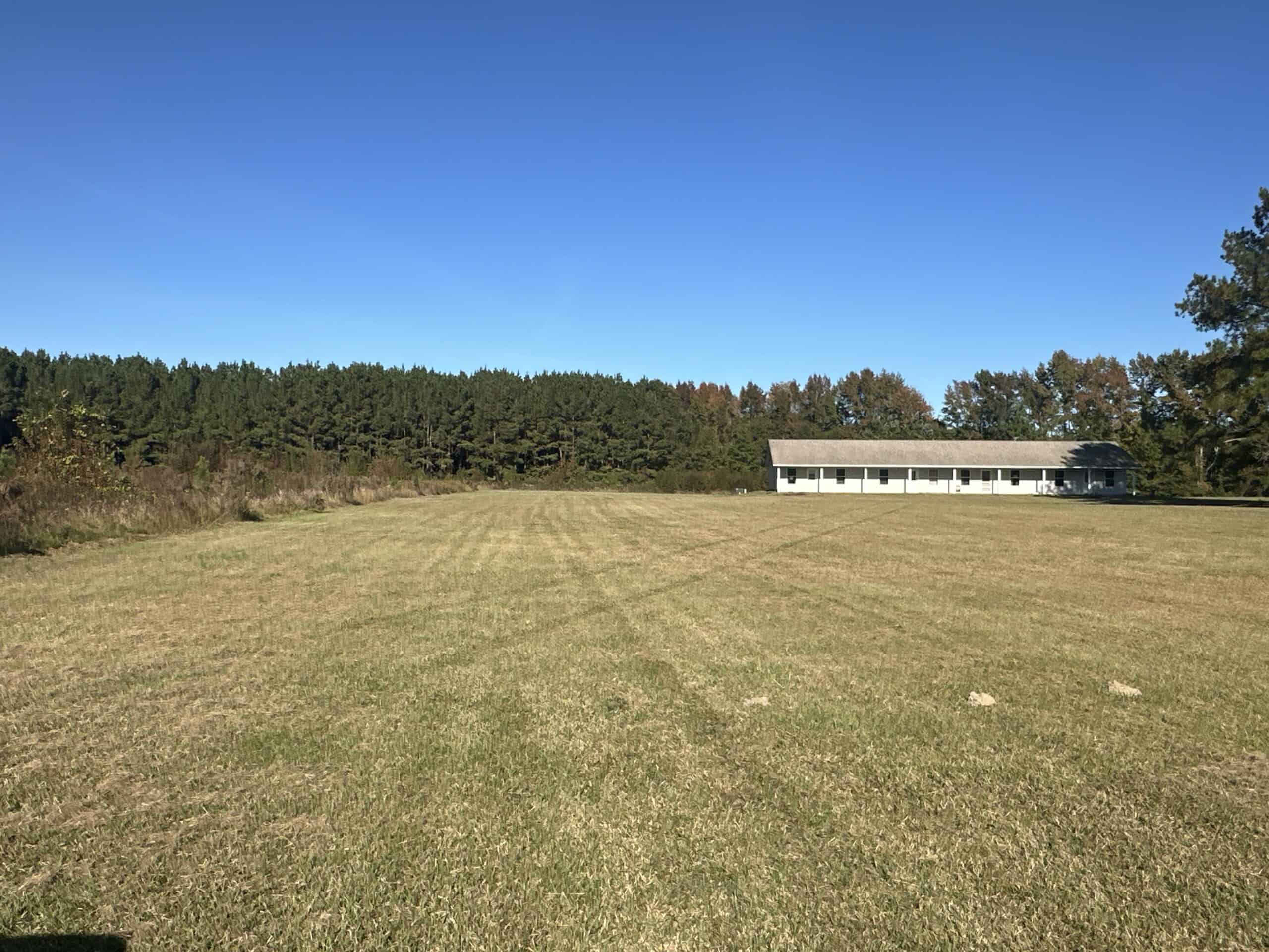 68.5-Acre Estate with Two Homes, Timberland & Barns Near US Hwy 64