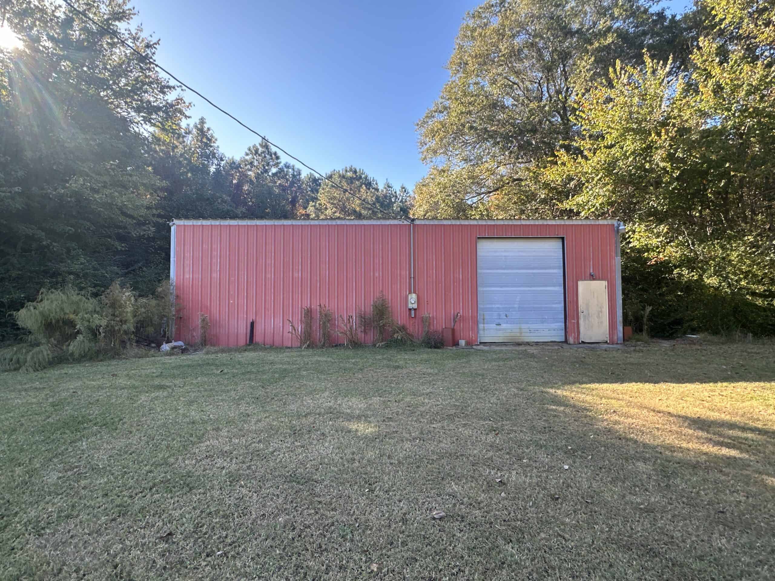 68.5-Acre Estate with Two Homes, Timberland & Barns Near US Hwy 64