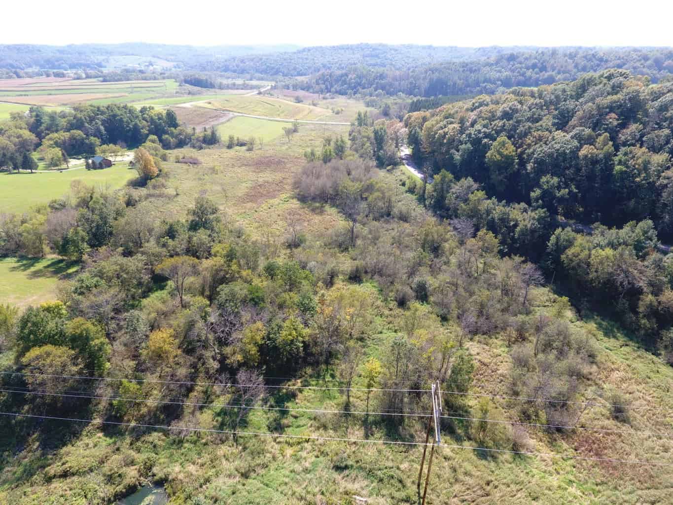 Land for sale with stream, crop ground, hunting, possible build site in WI