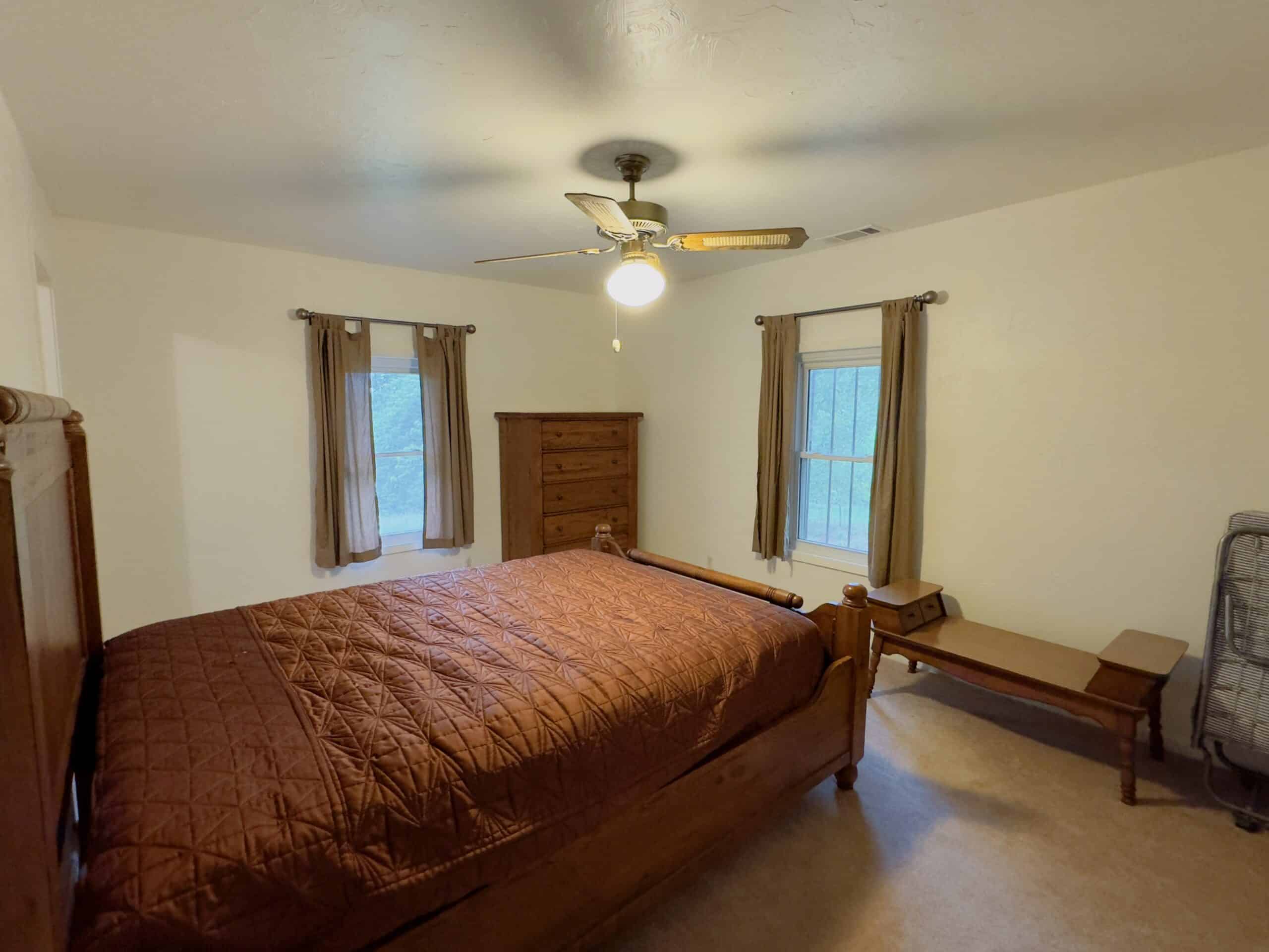 HOME WITH LARGE HUNTING ACREAGE AND FARMING LAND IN ARKANSAS