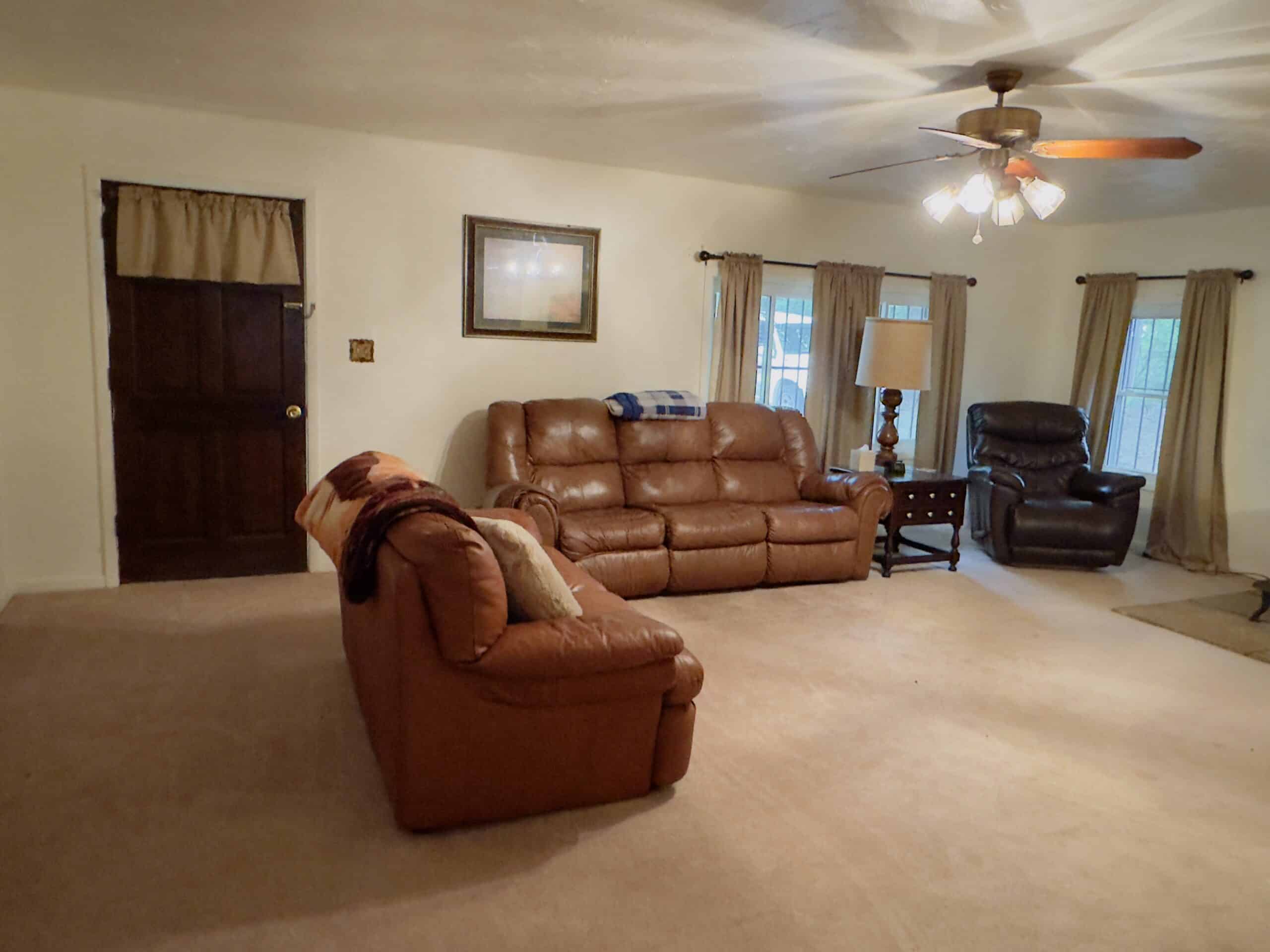 HOME WITH LARGE HUNTING ACREAGE AND FARMING LAND IN ARKANSAS