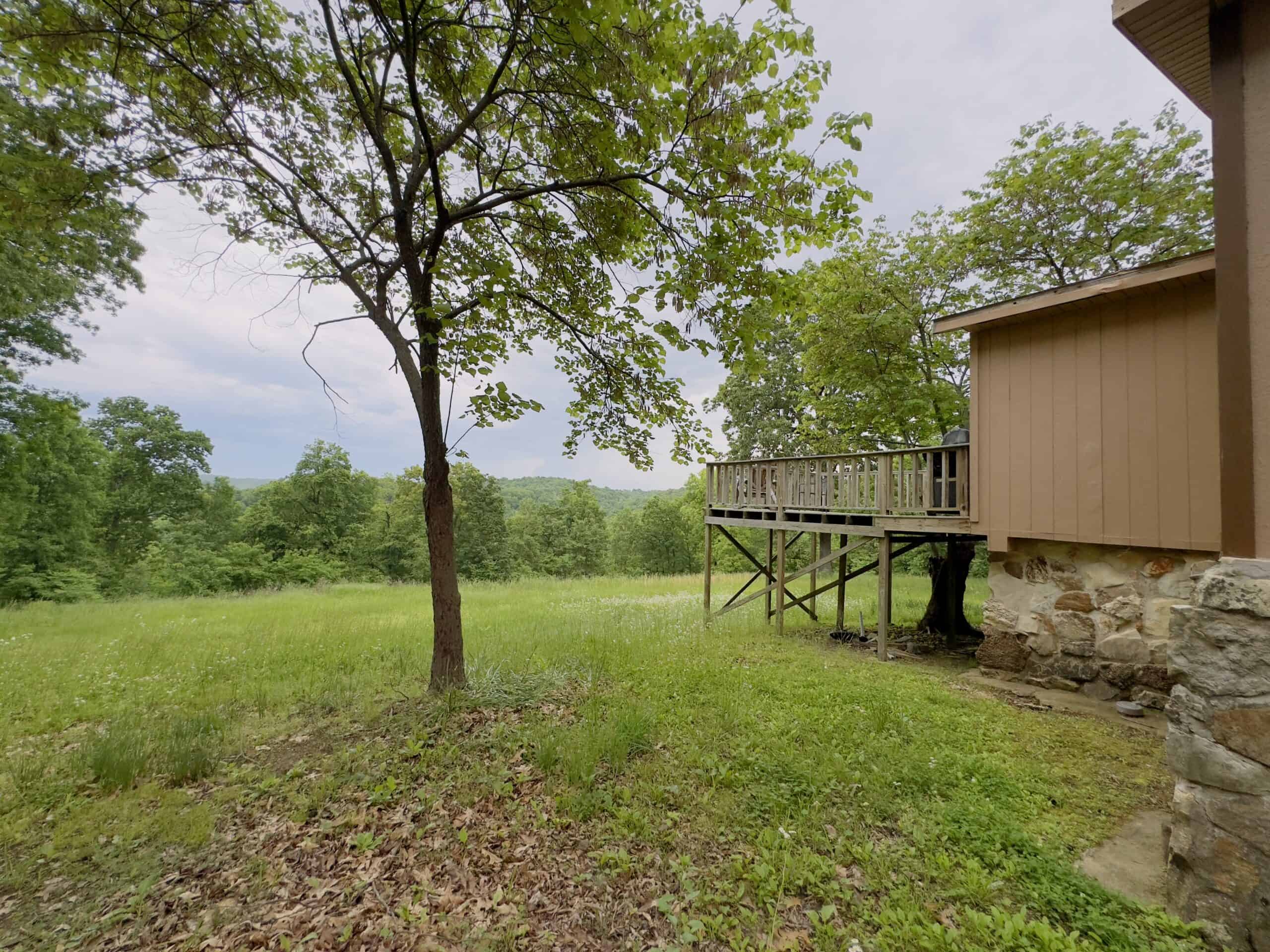 HOME WITH LARGE HUNTING ACREAGE AND FARMING LAND IN ARKANSAS