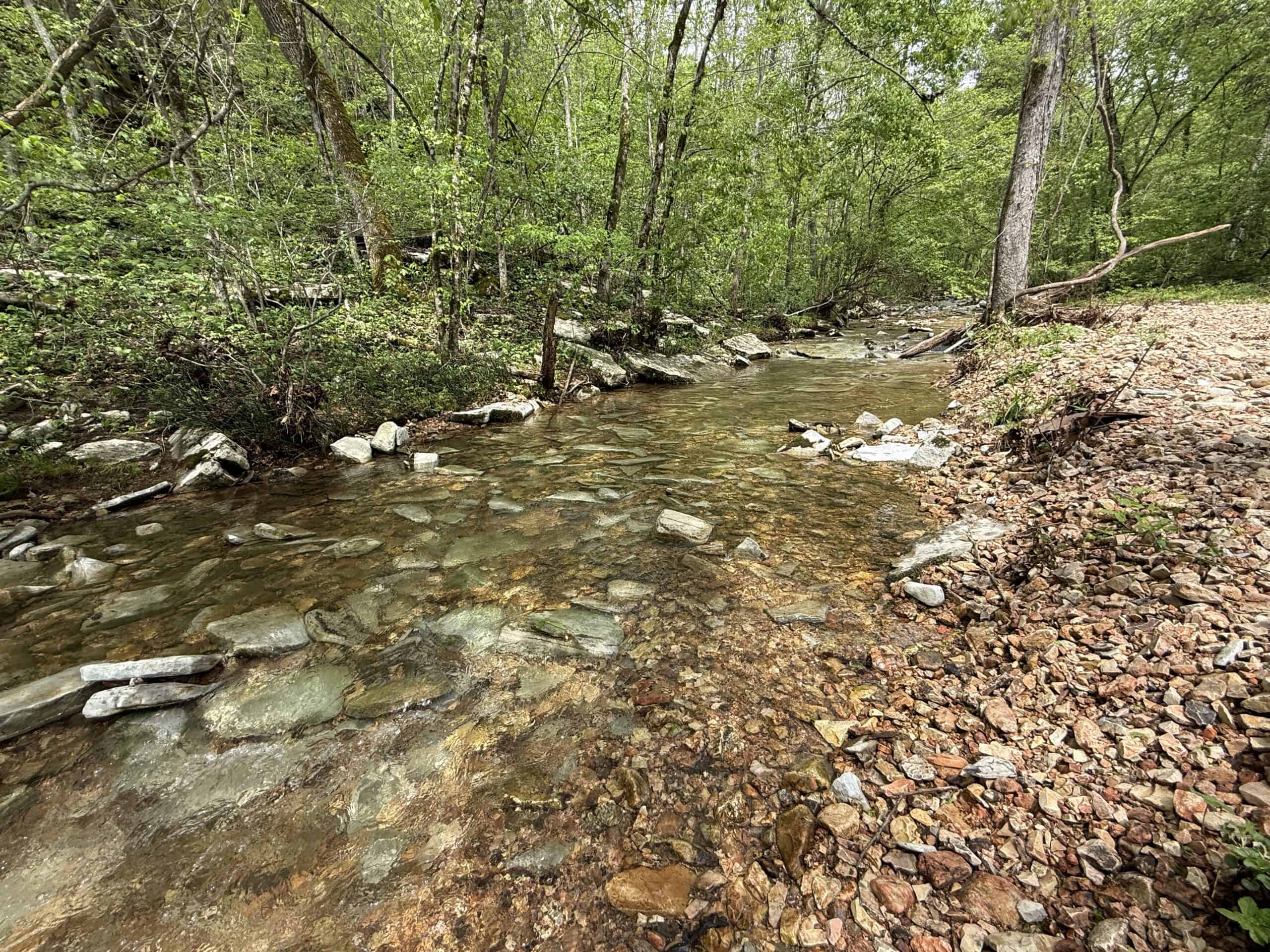 HOME WITH LARGE HUNTING ACREAGE AND FARMING LAND IN ARKANSAS