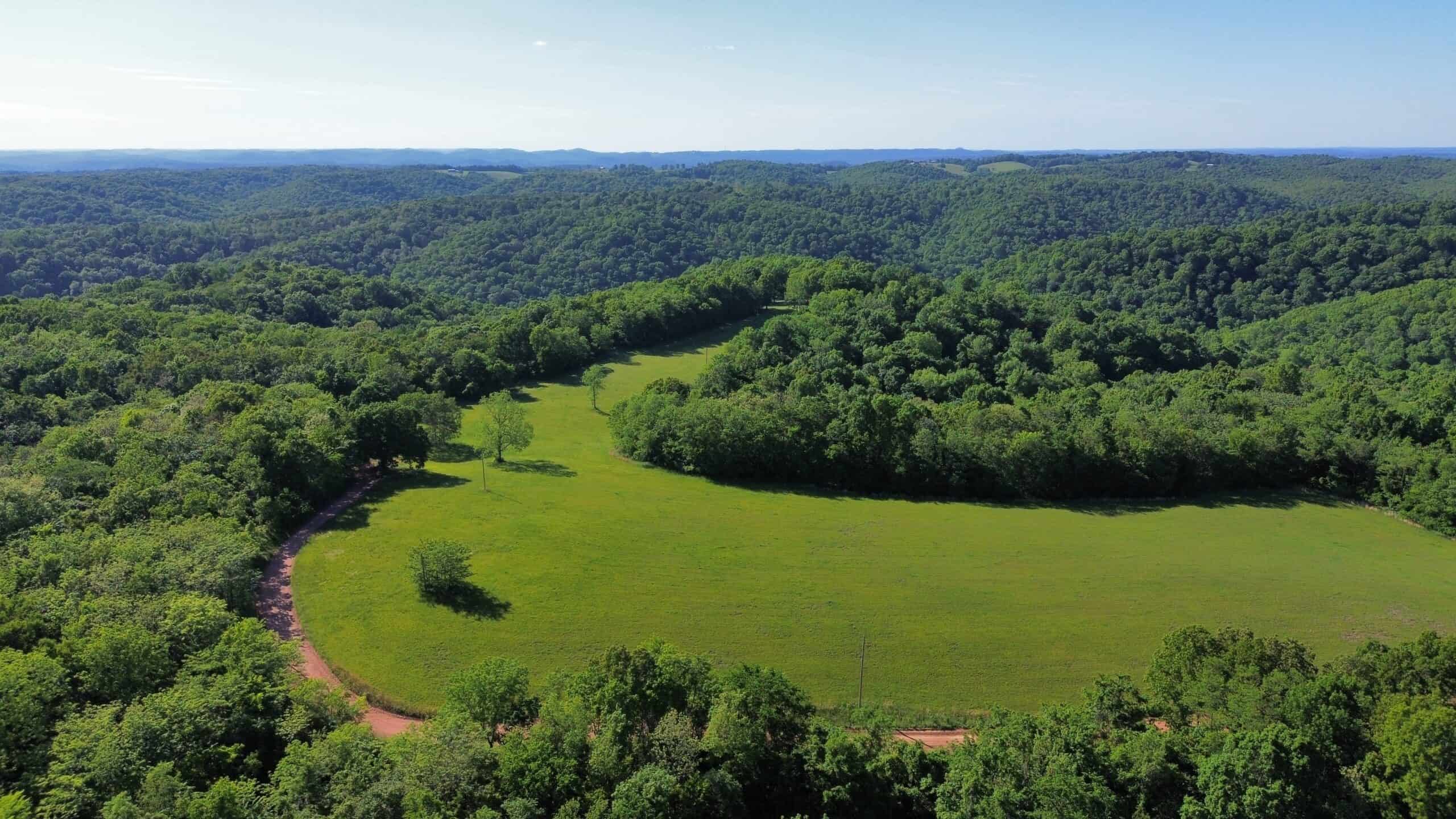 HOME WITH LARGE HUNTING ACREAGE AND FARMING LAND IN ARKANSAS