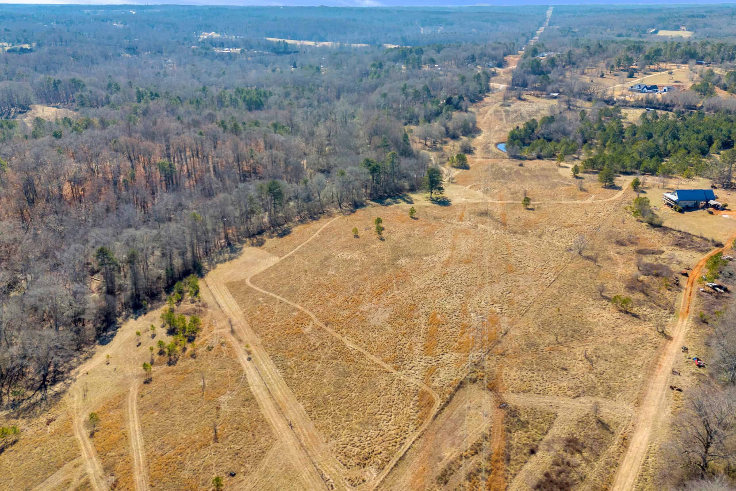 49+/- Acres of Beautiful Pasture with Two Ponds, Barn, and Creek Frontage.