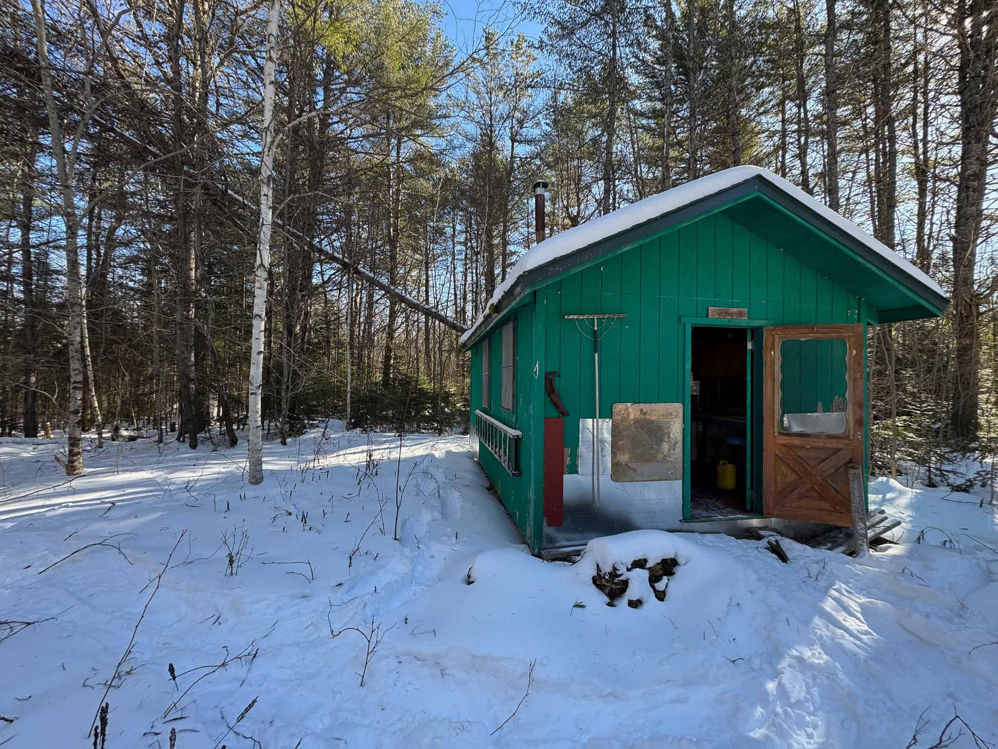 32 Acres with Off-Grid Cabin