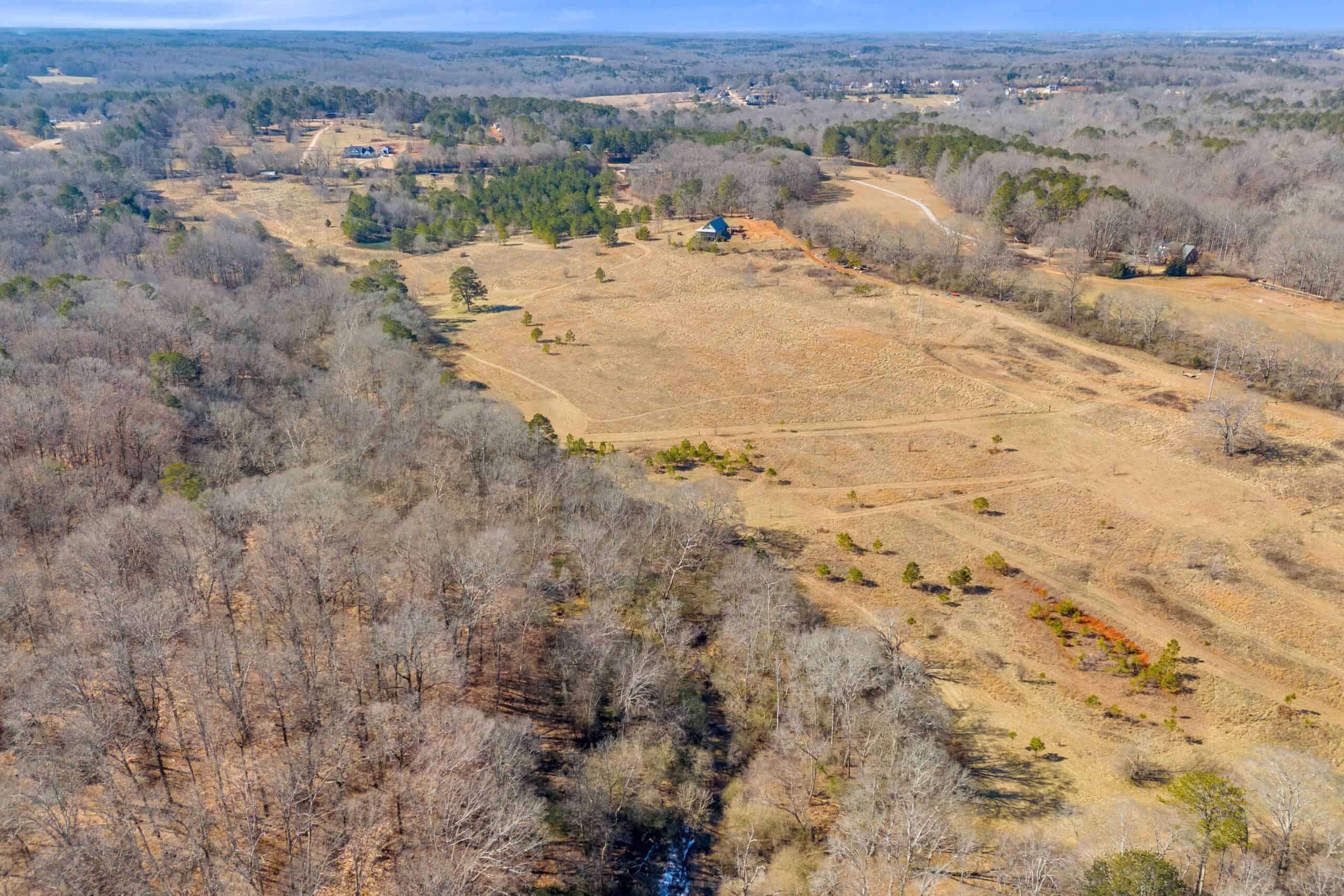 49+/- Acres of Beautiful Pasture with Two Ponds, Barn, and Creek Frontage.
