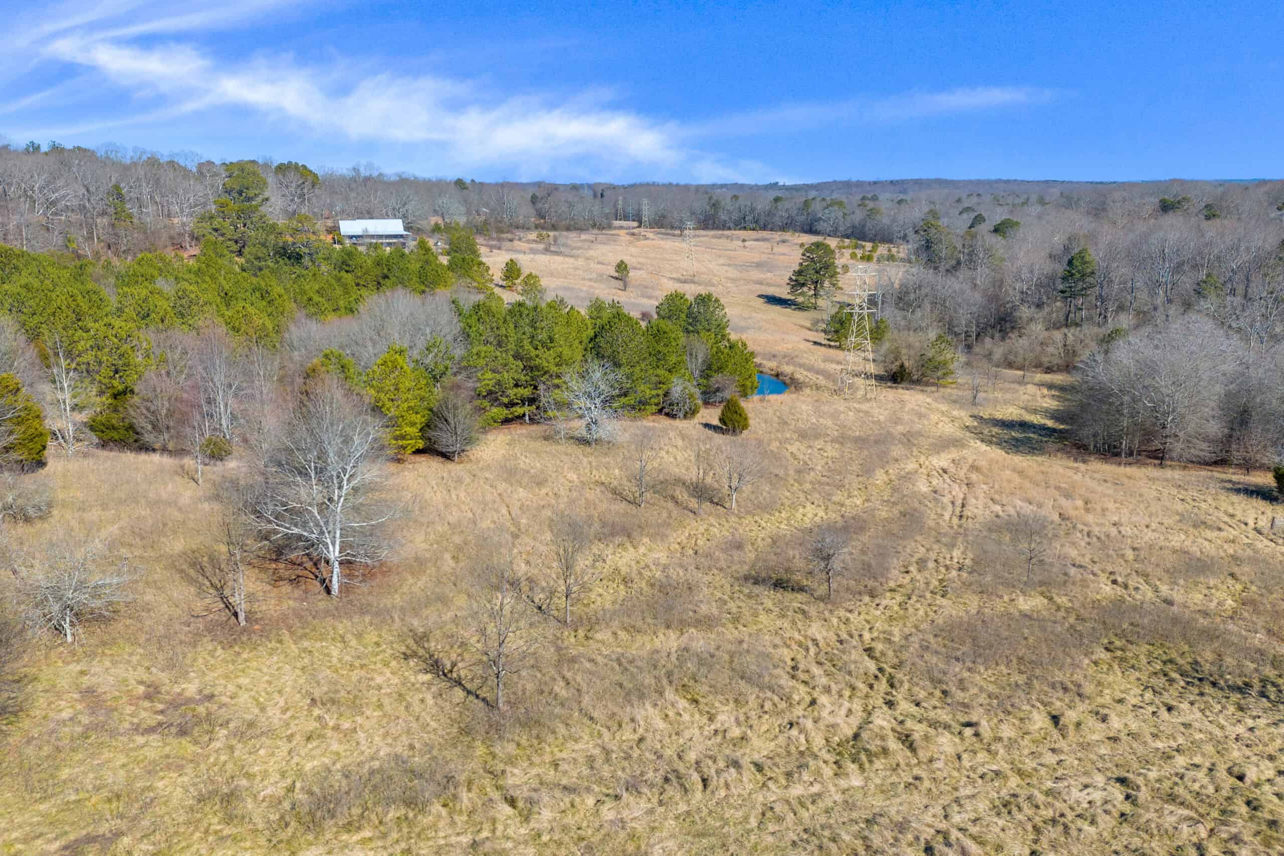 49+/- Acres of Beautiful Pasture with Two Ponds, Barn, and Creek Frontage.