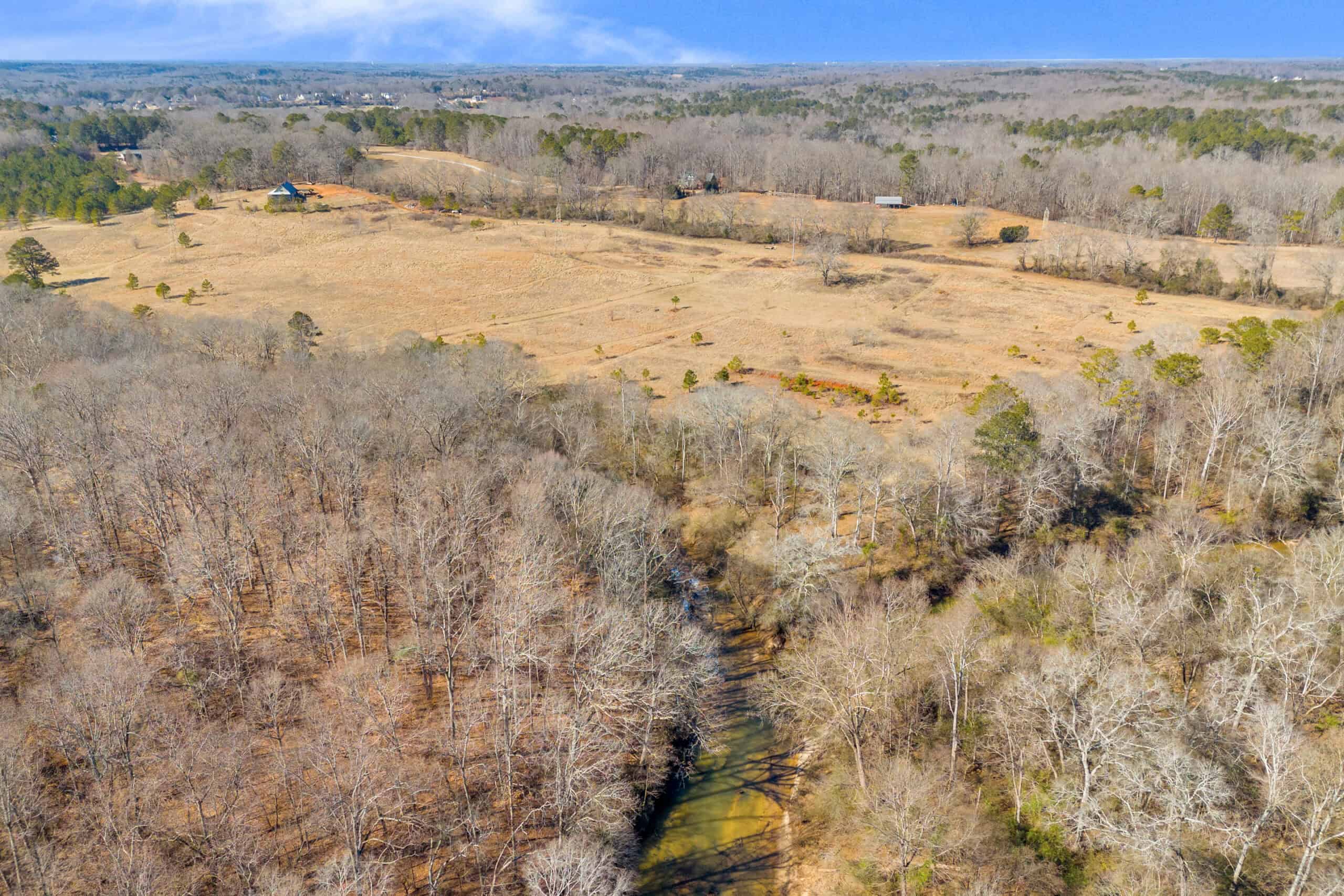 49+/- Acres of Beautiful Pasture with Two Ponds, Barn, and Creek Frontage.
