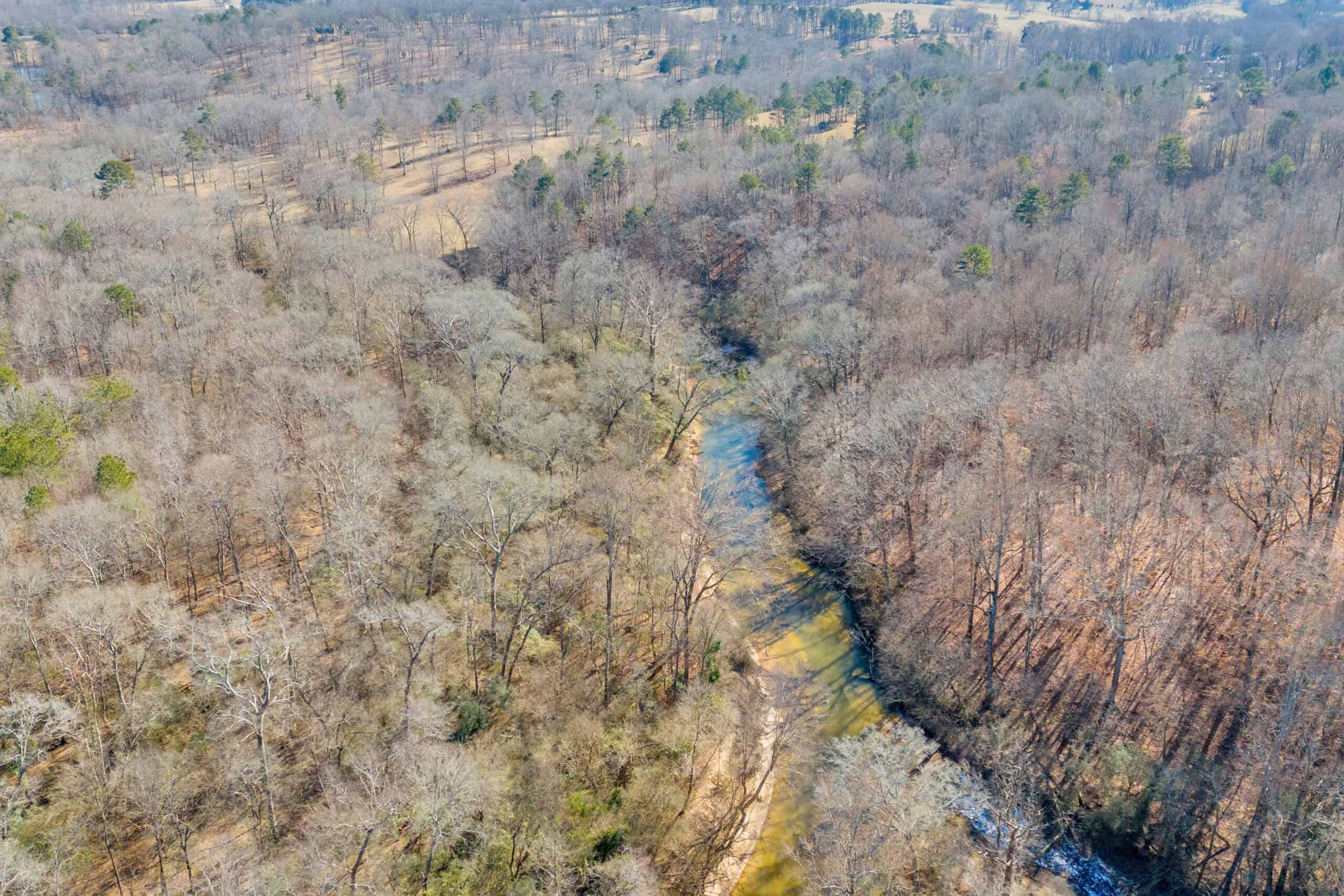 49+/- Acres of Beautiful Pasture with Two Ponds, Barn, and Creek Frontage.