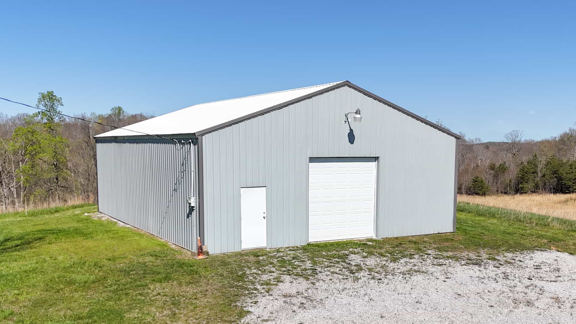 93 acre hunting property with home and large shop adjoining Lake Cumberland. Wayne County Kentucky. South Central Kentucky