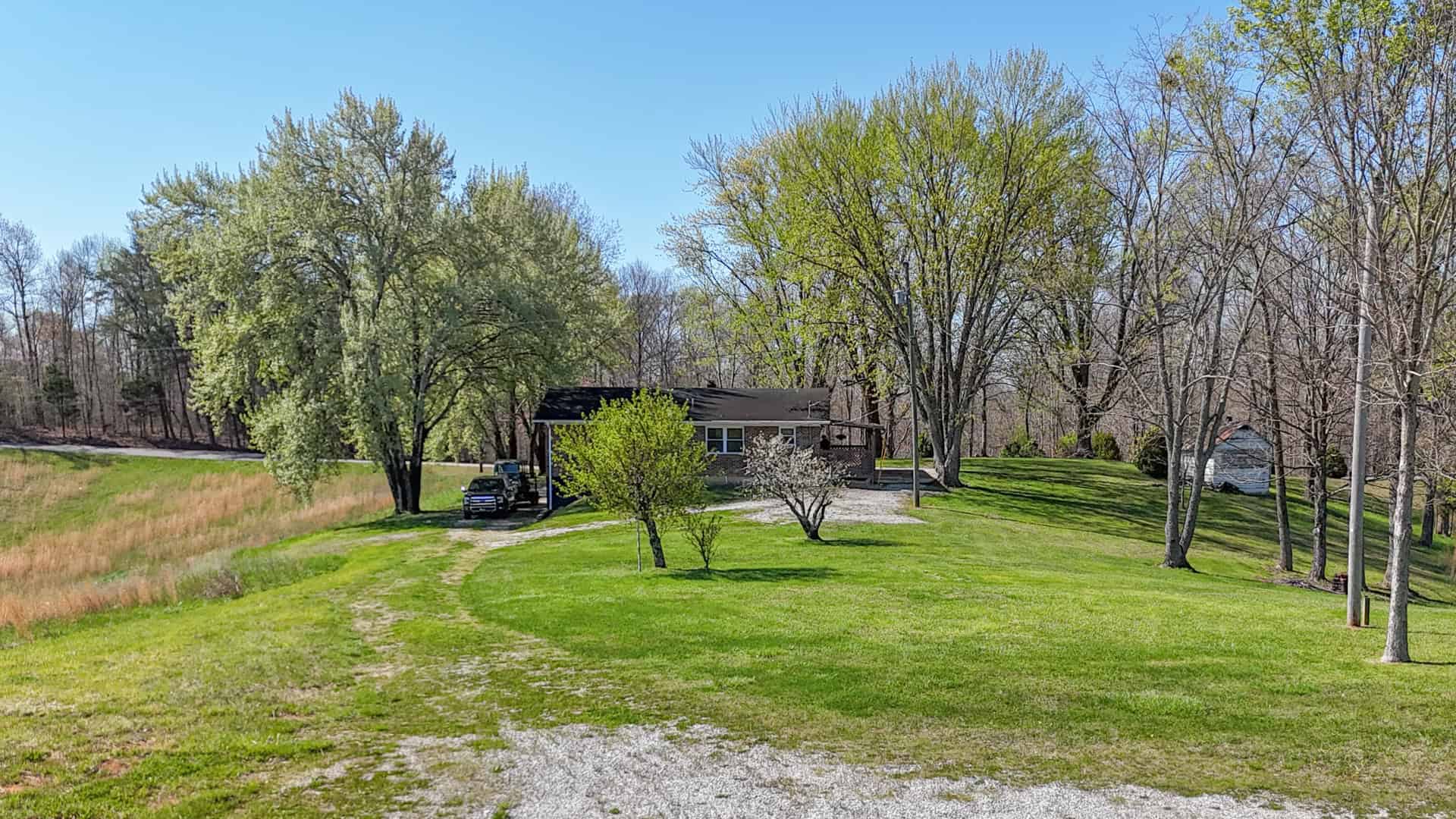 93 acre hunting property with home and large shop adjoining Lake Cumberland. Wayne County Kentucky. South Central Kentucky