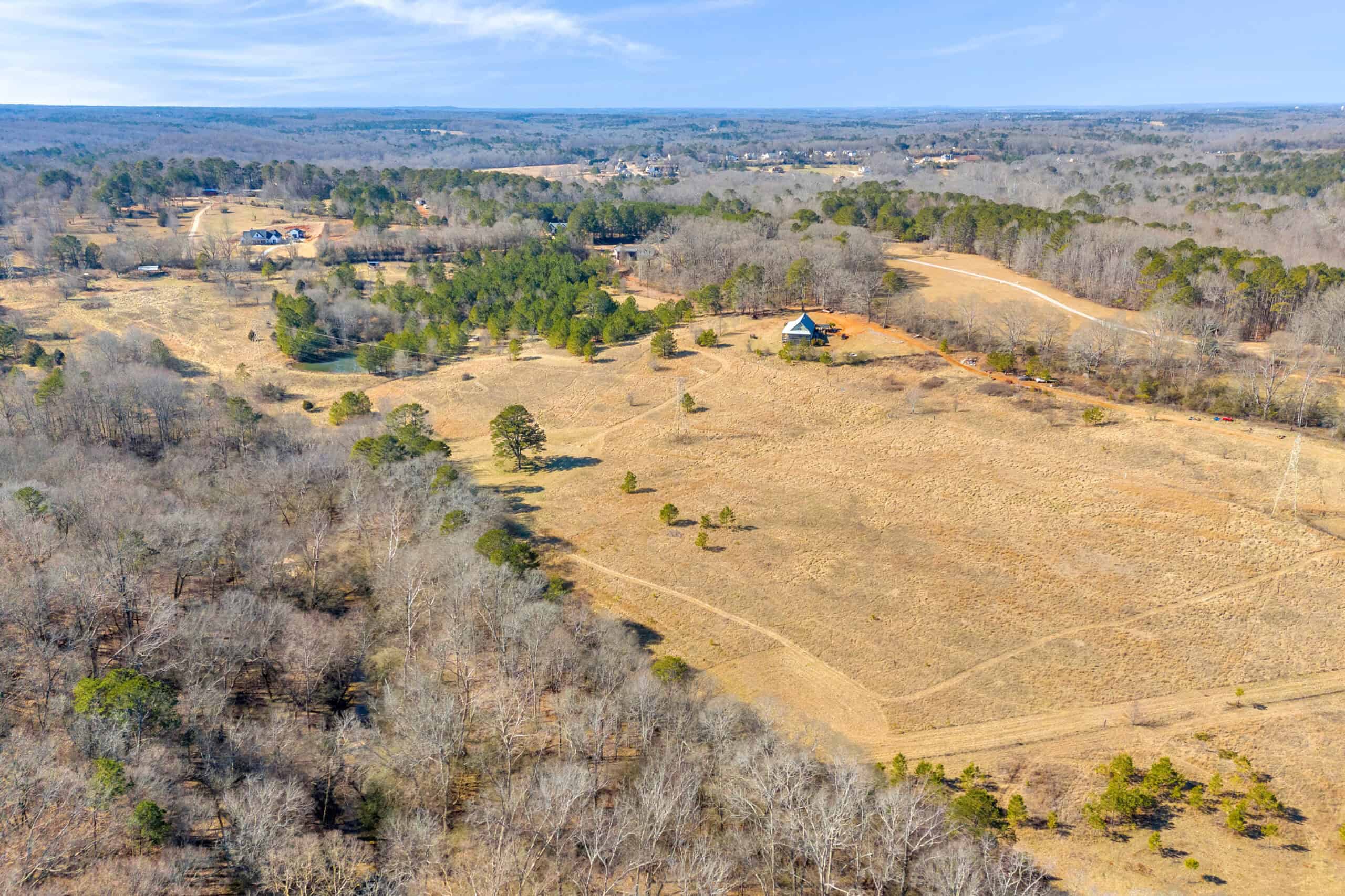 49+/- Acres of Beautiful Pasture with Two Ponds, Barn, and Creek Frontage.