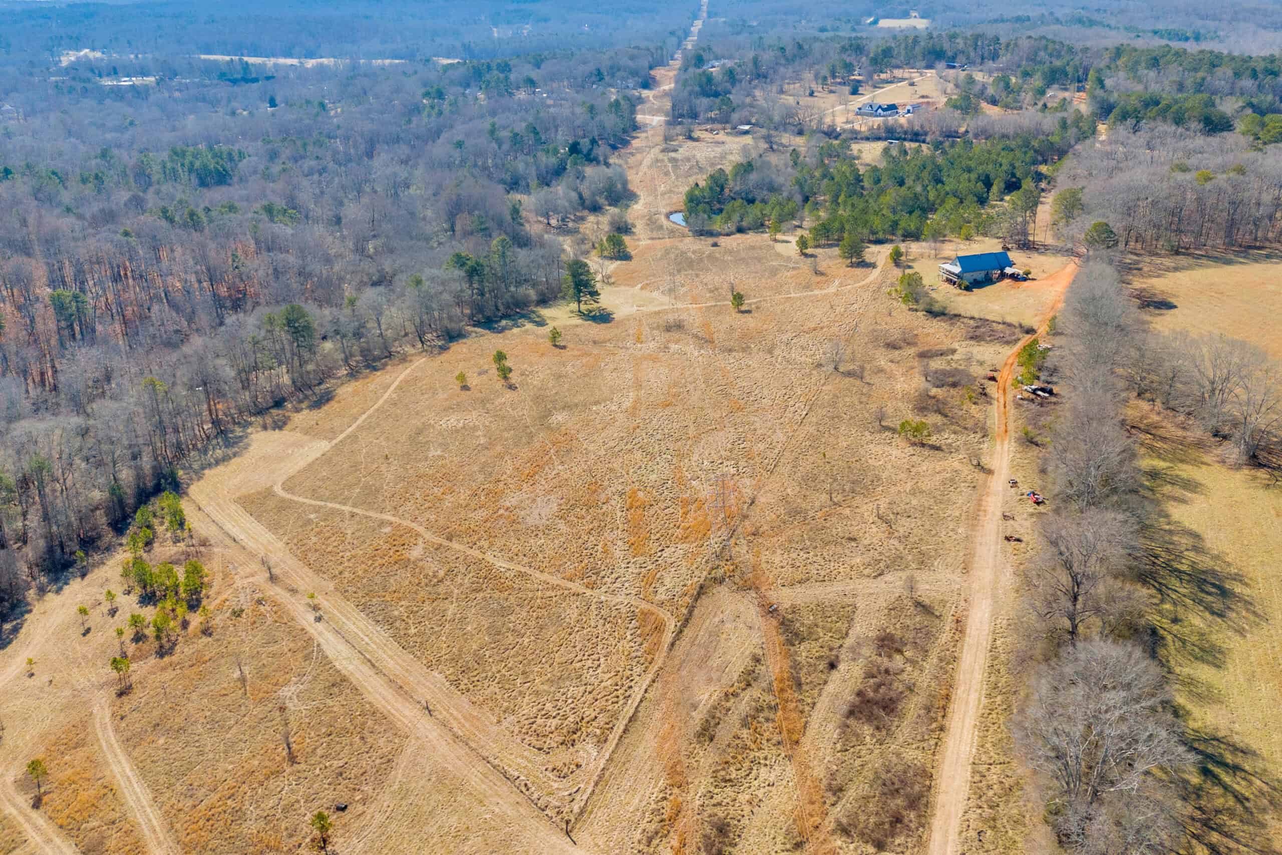 49+/- Acres of Beautiful Pasture with Two Ponds, Barn, and Creek Frontage.