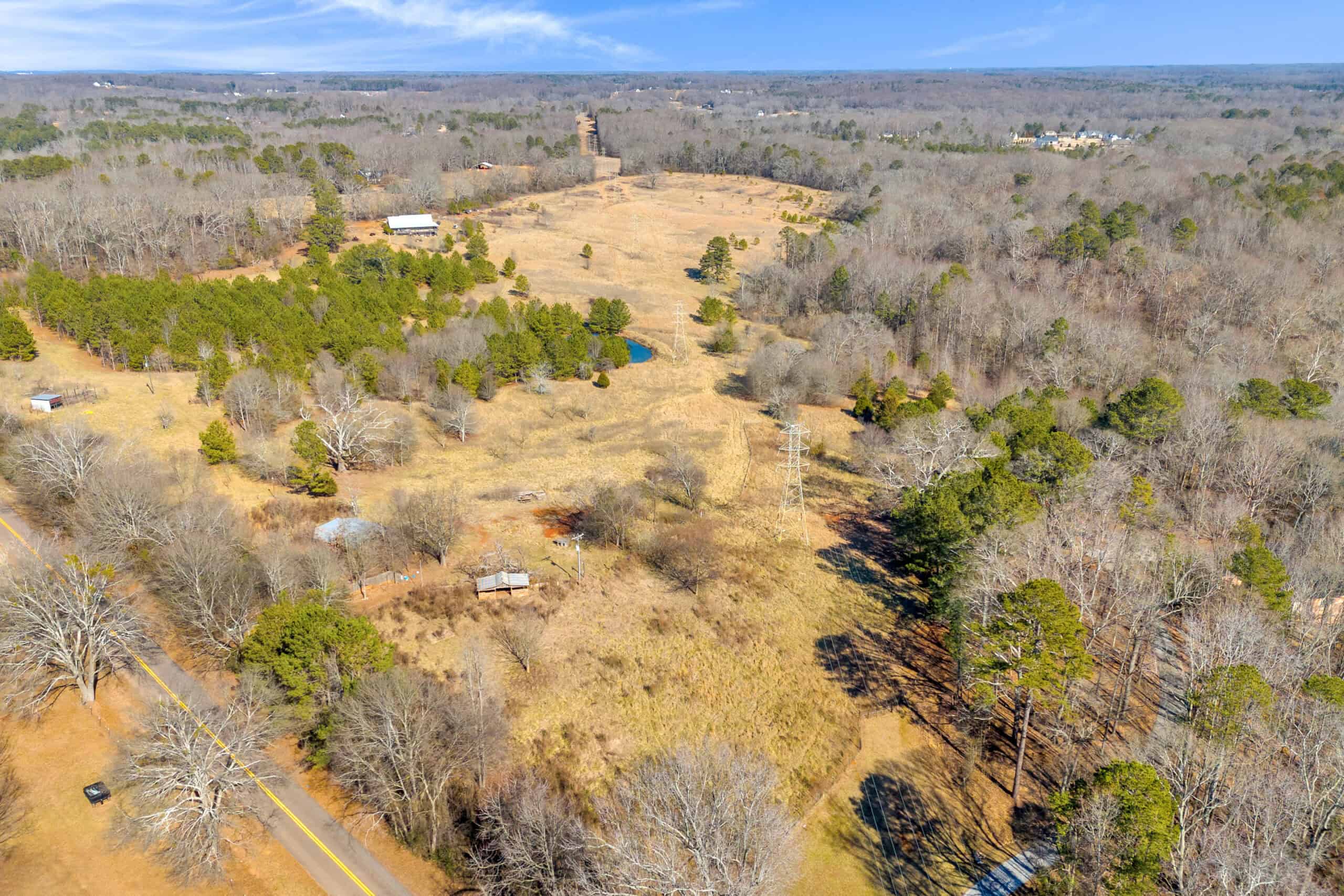 49+/- Acres of Beautiful Pasture with Two Ponds, Barn, and Creek Frontage.