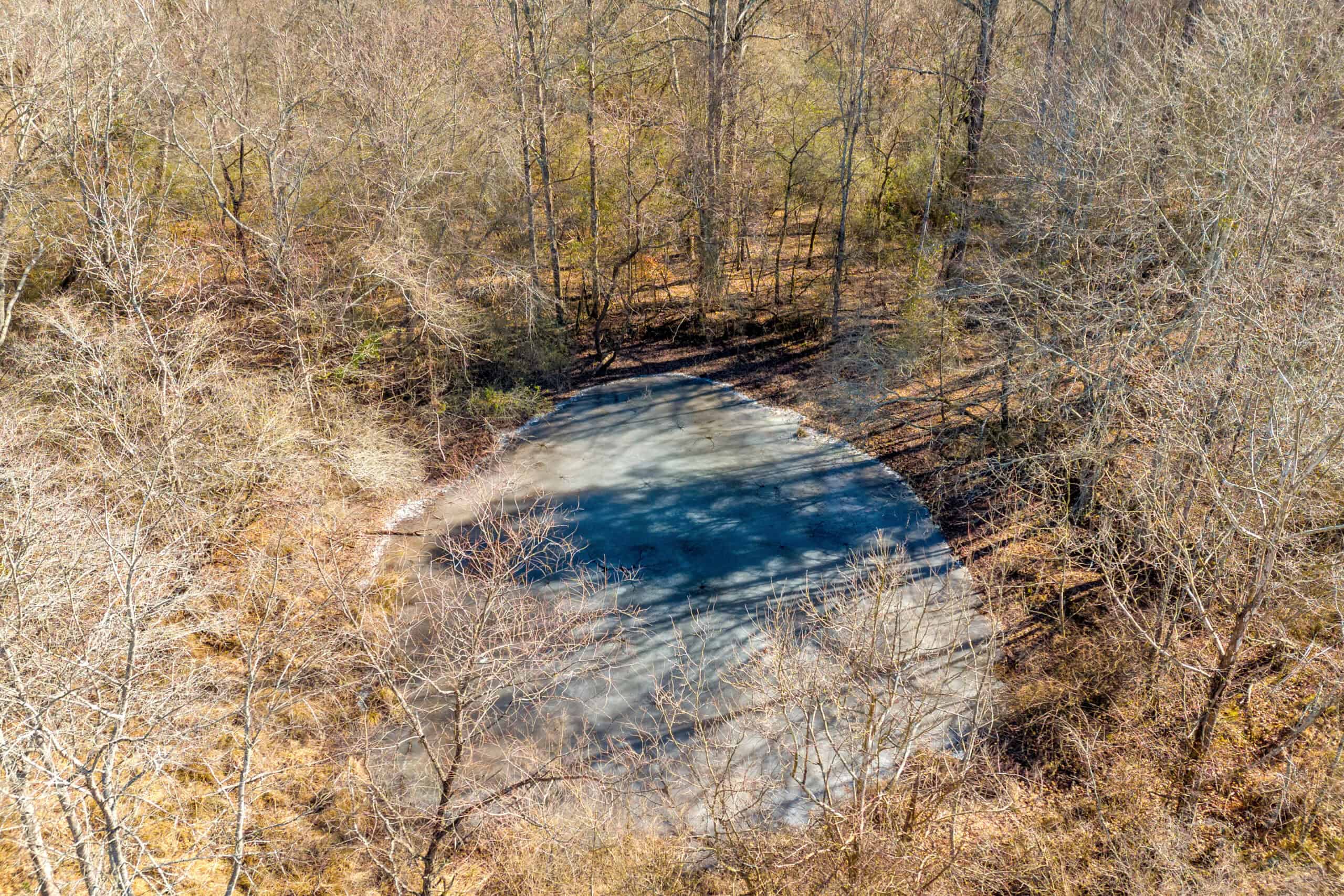 49+/- Acres of Beautiful Pasture with Two Ponds, Barn, and Creek Frontage.