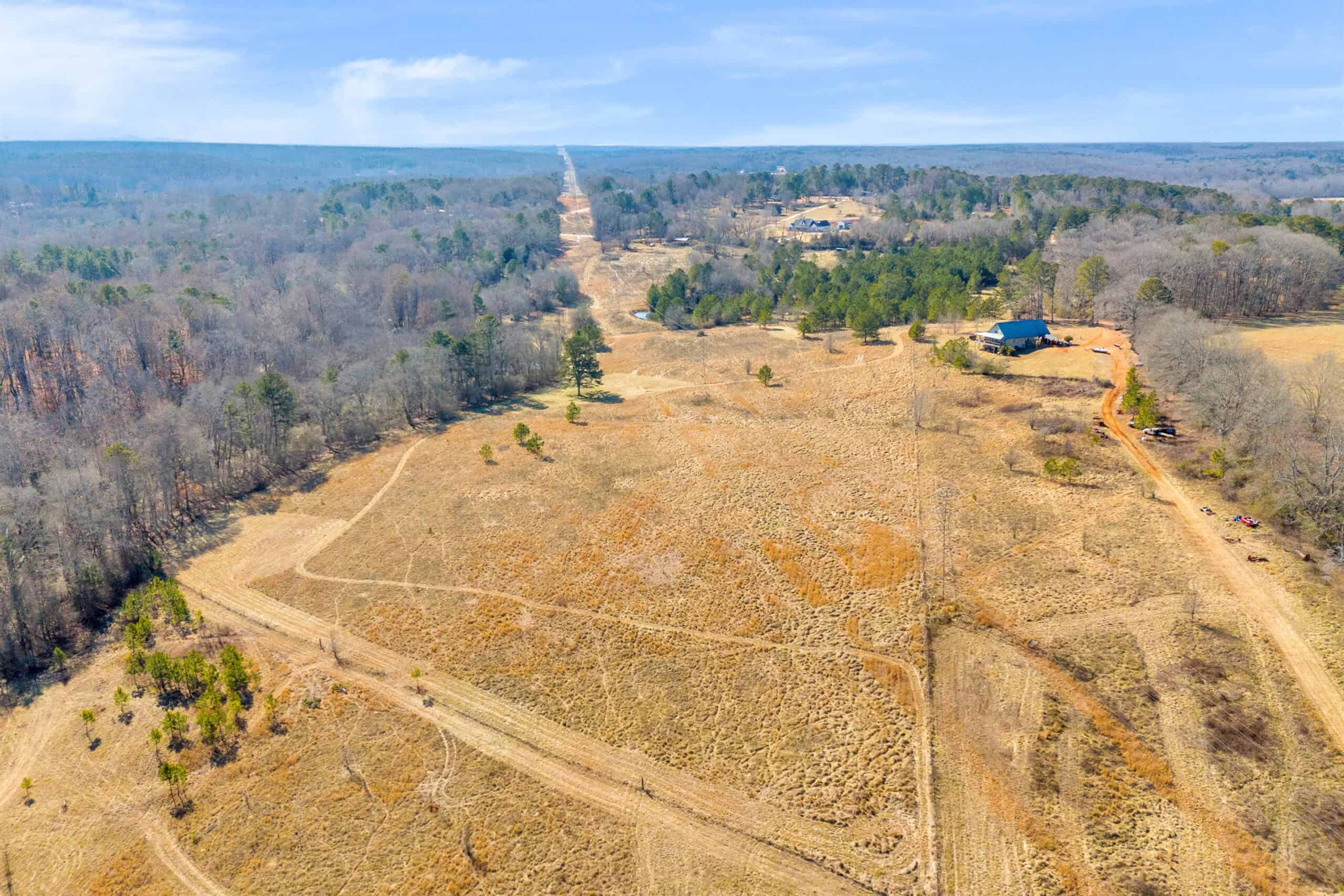 49+/- Acres of Beautiful Pasture with Two Ponds, Barn, and Creek Frontage.